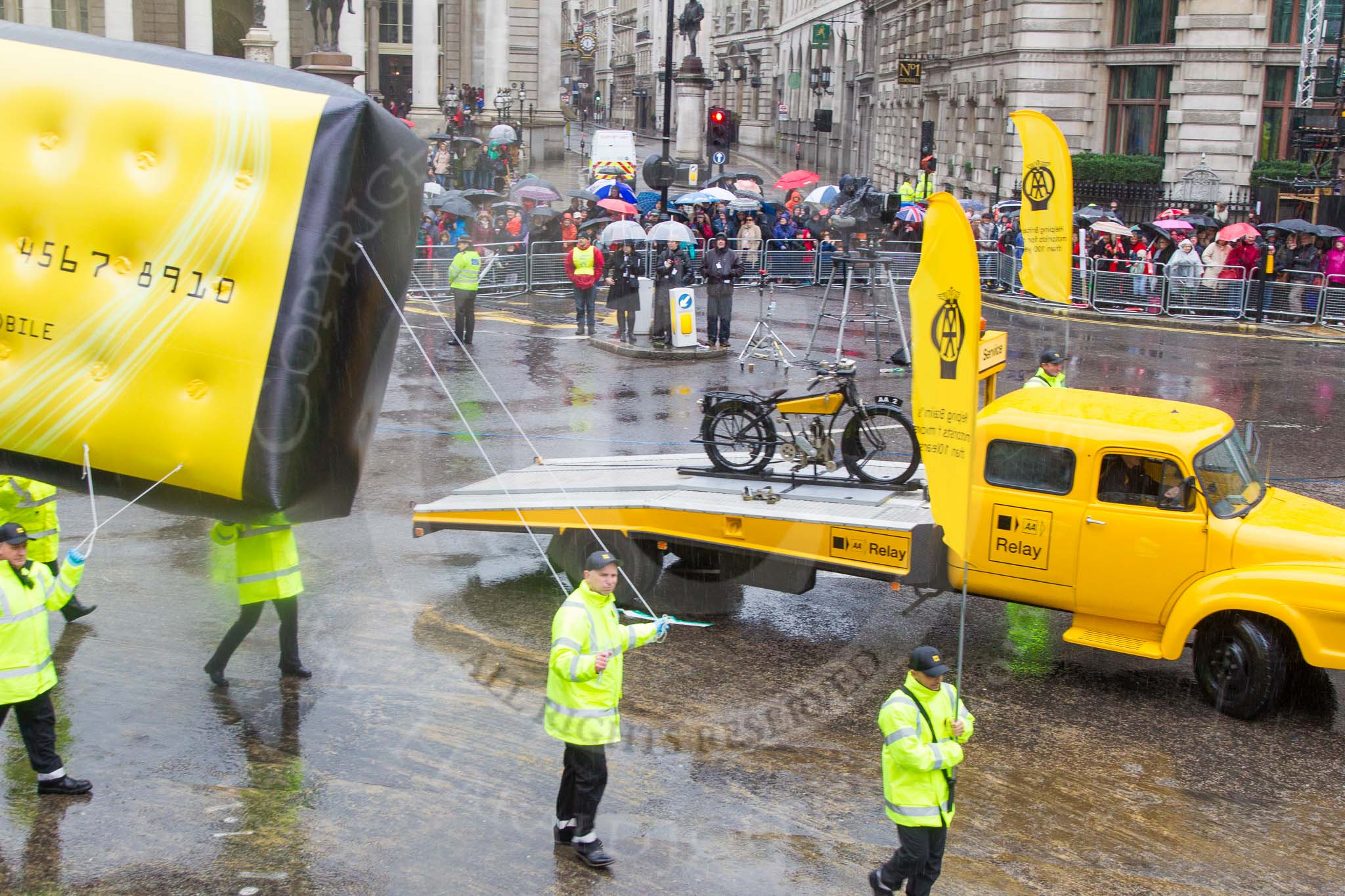 Lord Mayor's Show 2013: 60- The Automobile Association-AA1, the AA's 1904 Renault, and AA2 , a 1918 Chater-Lea motorcycle lead the AAs procession of historical amd modern patrol vehicles..
Press stand opposite Mansion House, City of London,
London,
Greater London,
United Kingdom,
on 09 November 2013 at 11:33, image #765