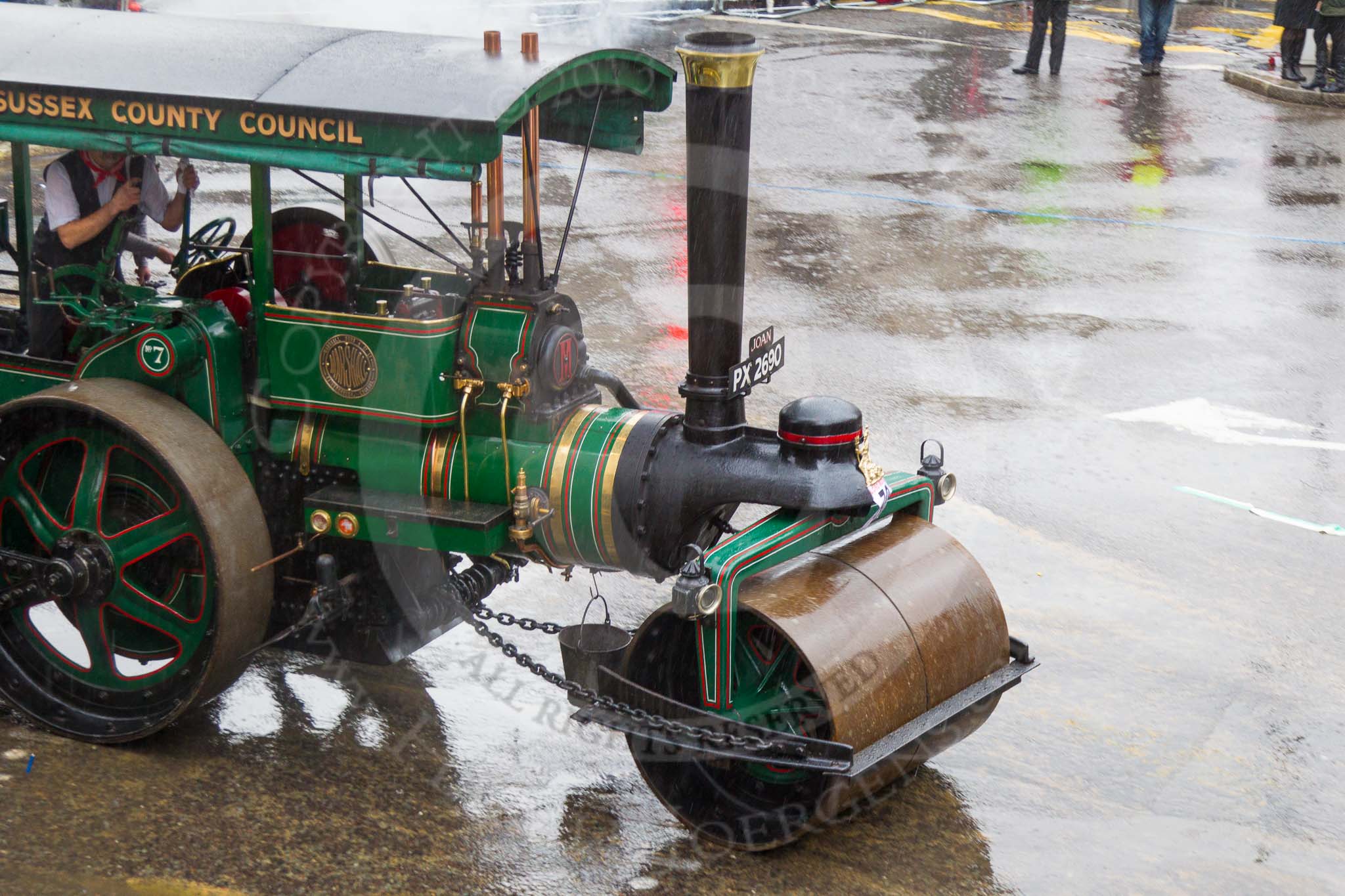 Lord Mayor's Show 2013: 70-Worshipful Company of Paviors-which brings together construction-industry professionals involved with roads and pavements.This year's float features the 'pig' that mediaeval paviors would have cleared from city streets and it towed by a steamroller from Amberley museum..
Press stand opposite Mansion House, City of London,
London,
Greater London,
United Kingdom,
on 09 November 2013 at 11:39, image #846