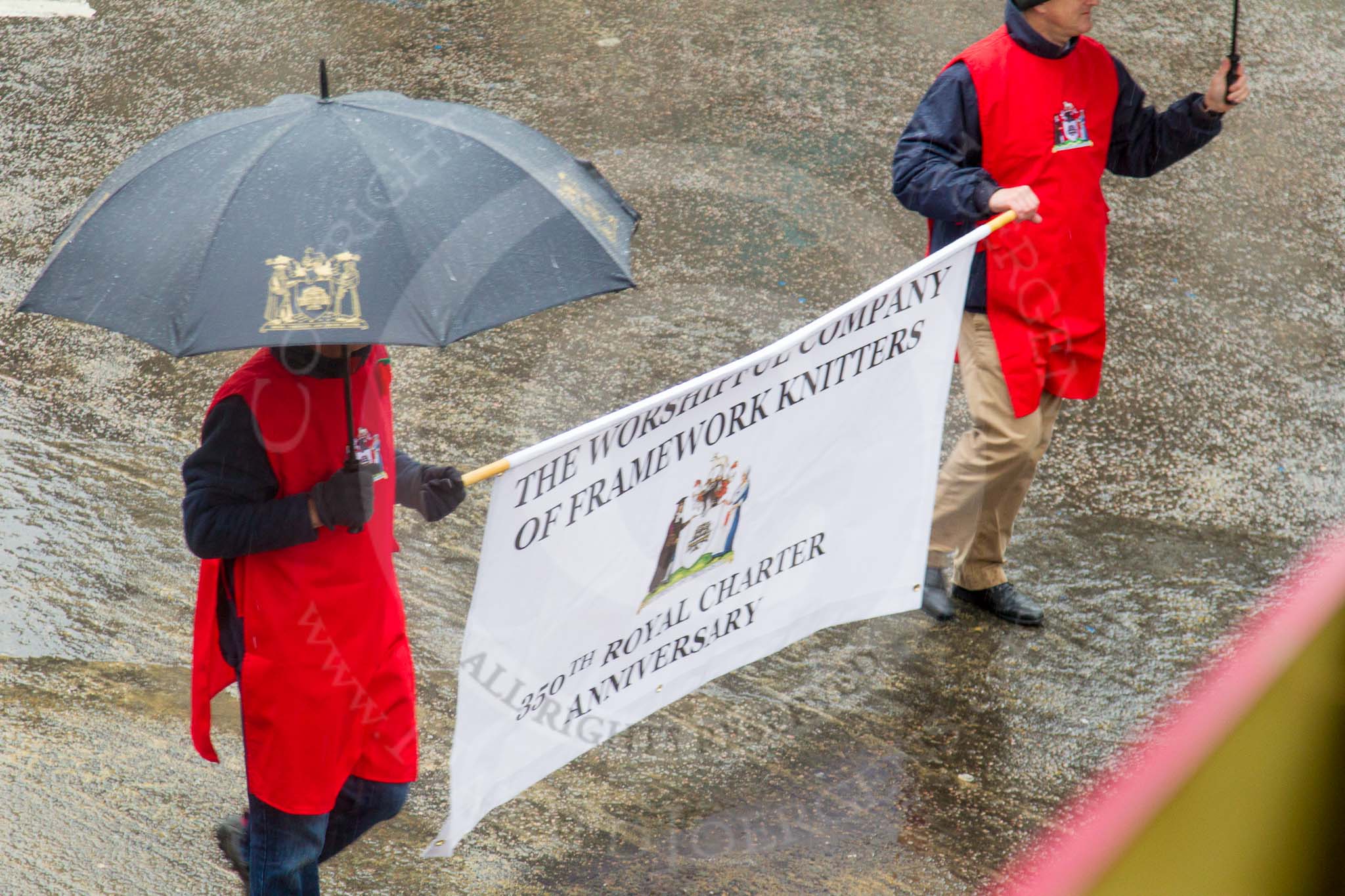 Lord Mayor's Show 2013: 75-Worshipful Company of Framework Knitters- this year Framework Knitters celebrate the 350th  anniversary of their Royal Charter. The main aim of Company is to promote excellence in the textile industry..
Press stand opposite Mansion House, City of London,
London,
Greater London,
United Kingdom,
on 09 November 2013 at 11:41, image #896