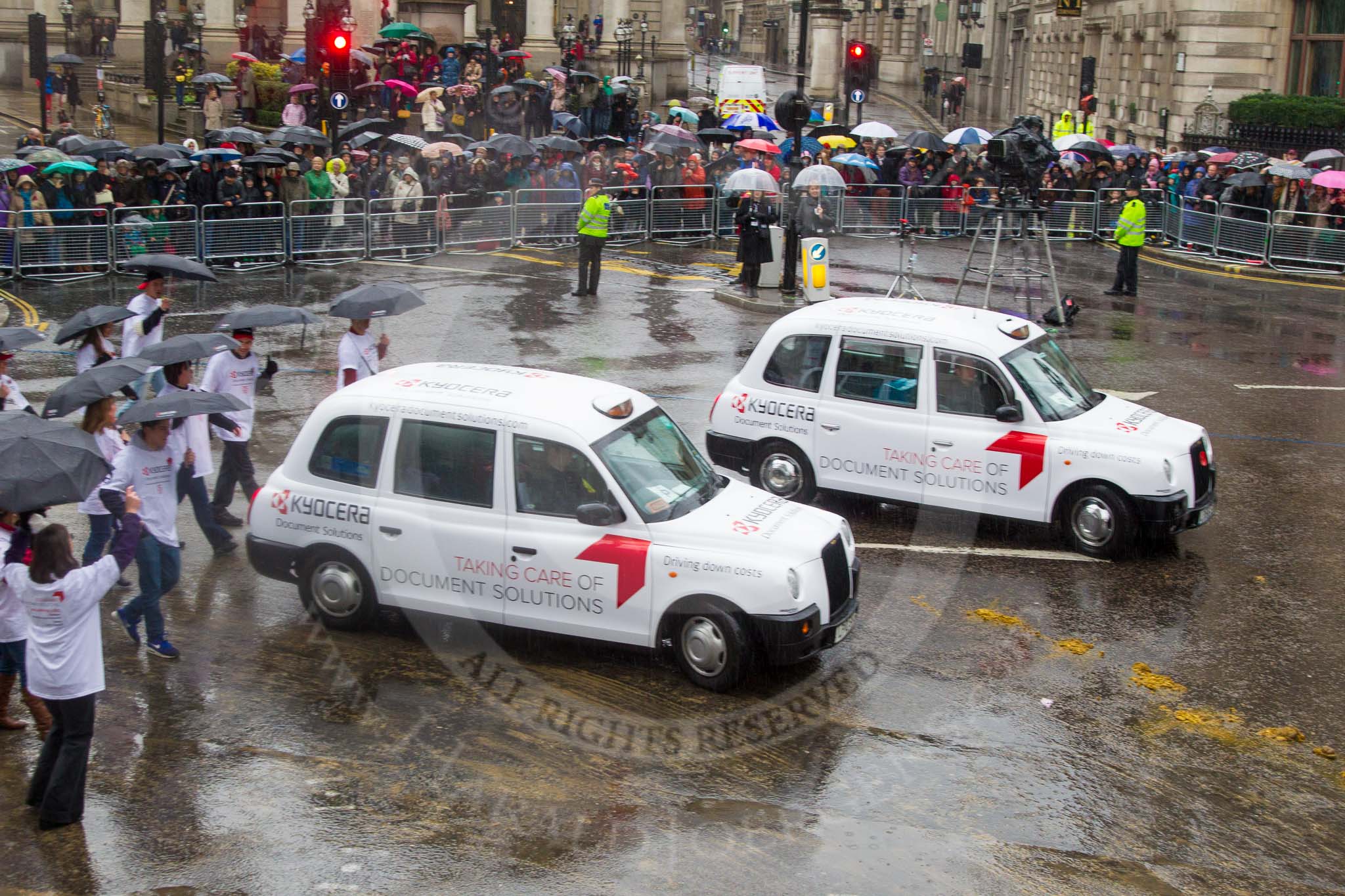 Lord Mayor's Show 2013: 80-Kyocera Document Solutions-celebrating 25 years of success in UK. Proud pioneers of sustainable, low-cost office printing, helps organisations across the public, private to save money , cut cost and reduce their footprint..
Press stand opposite Mansion House, City of London,
London,
Greater London,
United Kingdom,
on 09 November 2013 at 11:43, image #932