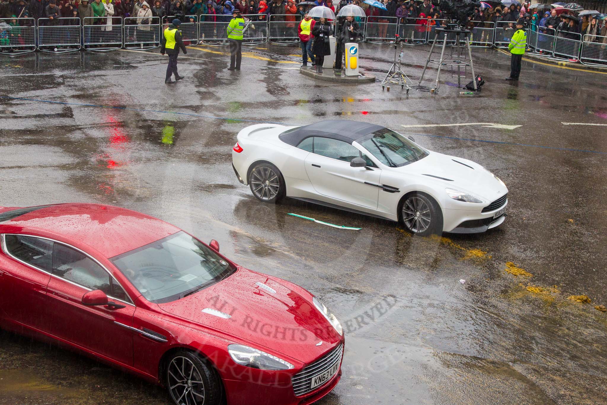 Lord Mayor's Show 2013: 78-Aston Martin Lagonda representing the Coachmakers- reflecting its modern association with the motor industry, the Company of Coachmakers and Coach Harness Makers is collaborating with Aston Martin, which this year celebrate 100 years of 'power, beauty and soul'..
Press stand opposite Mansion House, City of London,
London,
Greater London,
United Kingdom,
on 09 November 2013 at 11:43, image #945