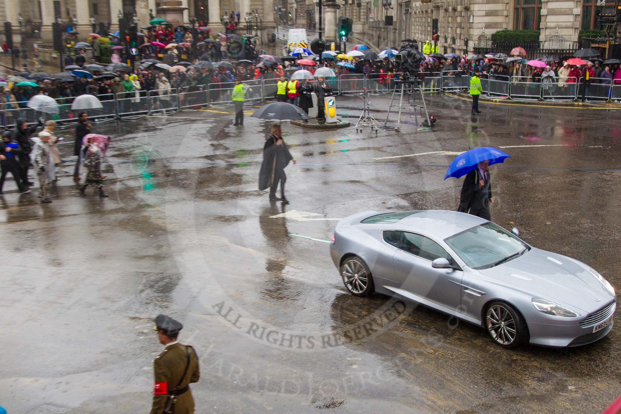 Lord Mayor's Show 2013: 78-Aston Martin Lagonda representing the Coachmakers- reflecting its modern association with the motor industry, the Company of Coachmakers and Coach Harness Makers is collaborating with Aston Martin, which this year celebrate 100 years of 'power, beauty and soul'..
Press stand opposite Mansion House, City of London,
London,
Greater London,
United Kingdom,
on 09 November 2013 at 11:43, image #948