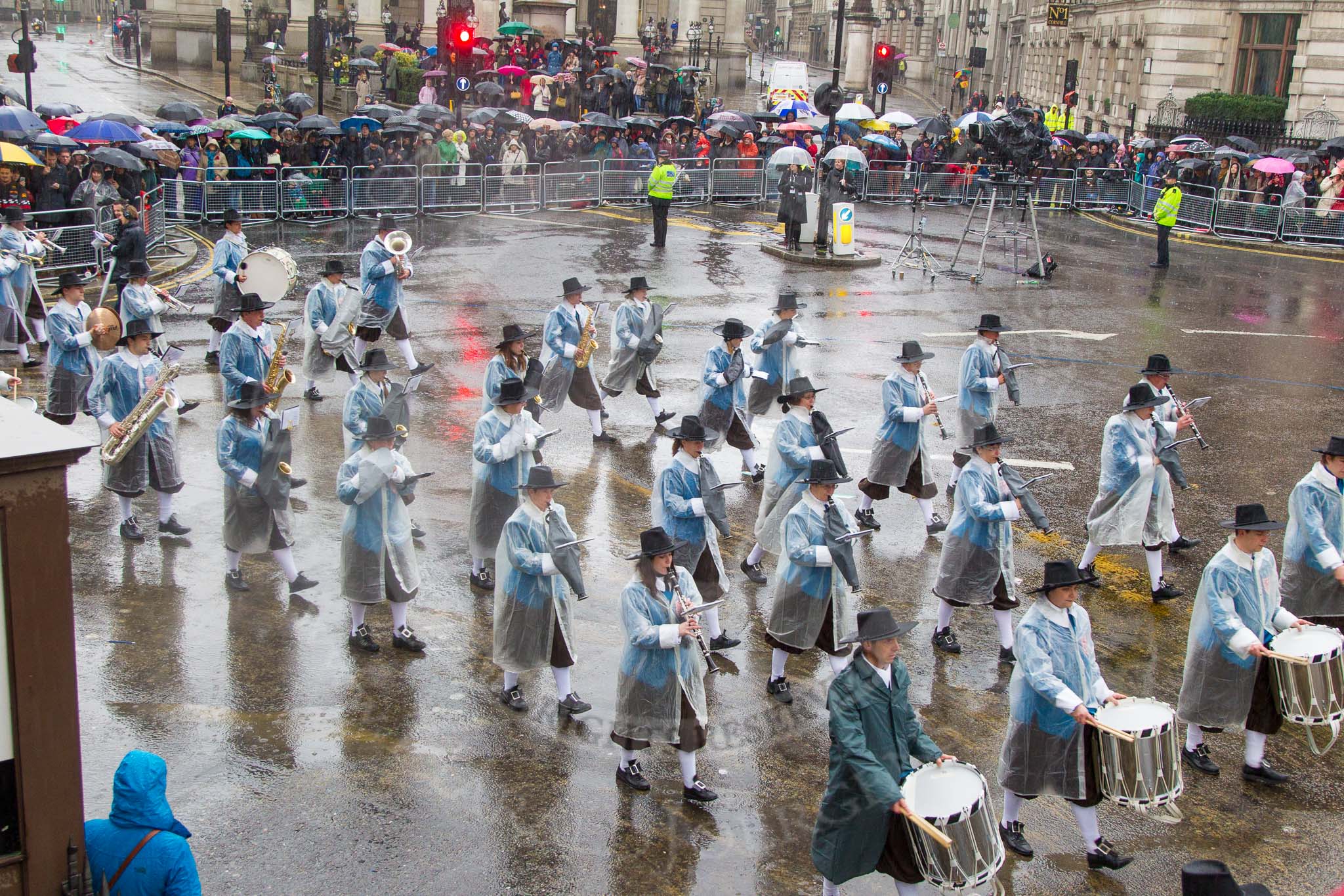 Lord Mayor's Show 2013: 81-Zunft Zur Zimmerleuten Band- the band traditionally supports the Zurich Swiss Gild of the Zimmerleuten in its parade and pageants, and is continuing that tradition today..
Press stand opposite Mansion House, City of London,
London,
Greater London,
United Kingdom,
on 09 November 2013 at 11:45, image #970