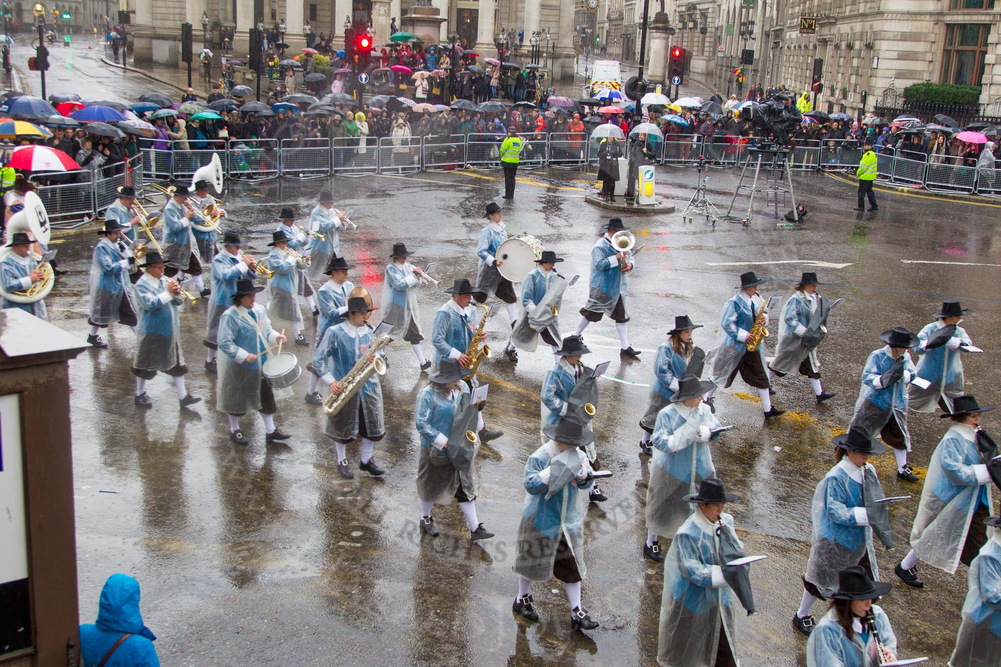 Lord Mayor's Show 2013: 81-Zunft Zur Zimmerleuten Band- the band traditionally supports the Zurich Swiss Gild of the Zimmerleuten in its parade and pageants, and is continuing that tradition today..
Press stand opposite Mansion House, City of London,
London,
Greater London,
United Kingdom,
on 09 November 2013 at 11:45, image #972