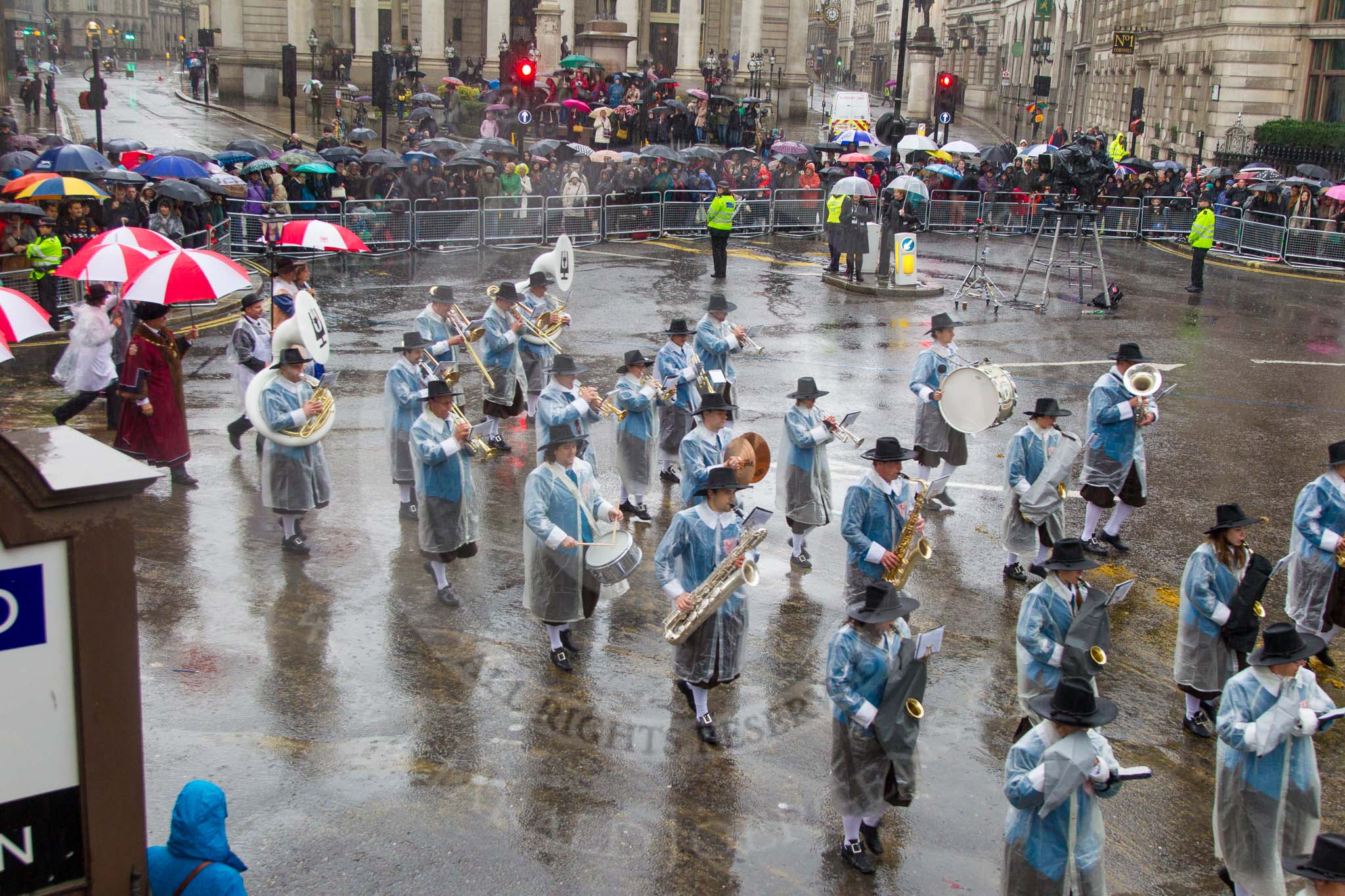 Lord Mayor's Show 2013: 81-Zunft Zur Zimmerleuten Band- the band traditionally supports the Zurich Swiss Gild of the Zimmerleuten in its parade and pageants, and is continuing that tradition today..
Press stand opposite Mansion House, City of London,
London,
Greater London,
United Kingdom,
on 09 November 2013 at 11:45, image #974