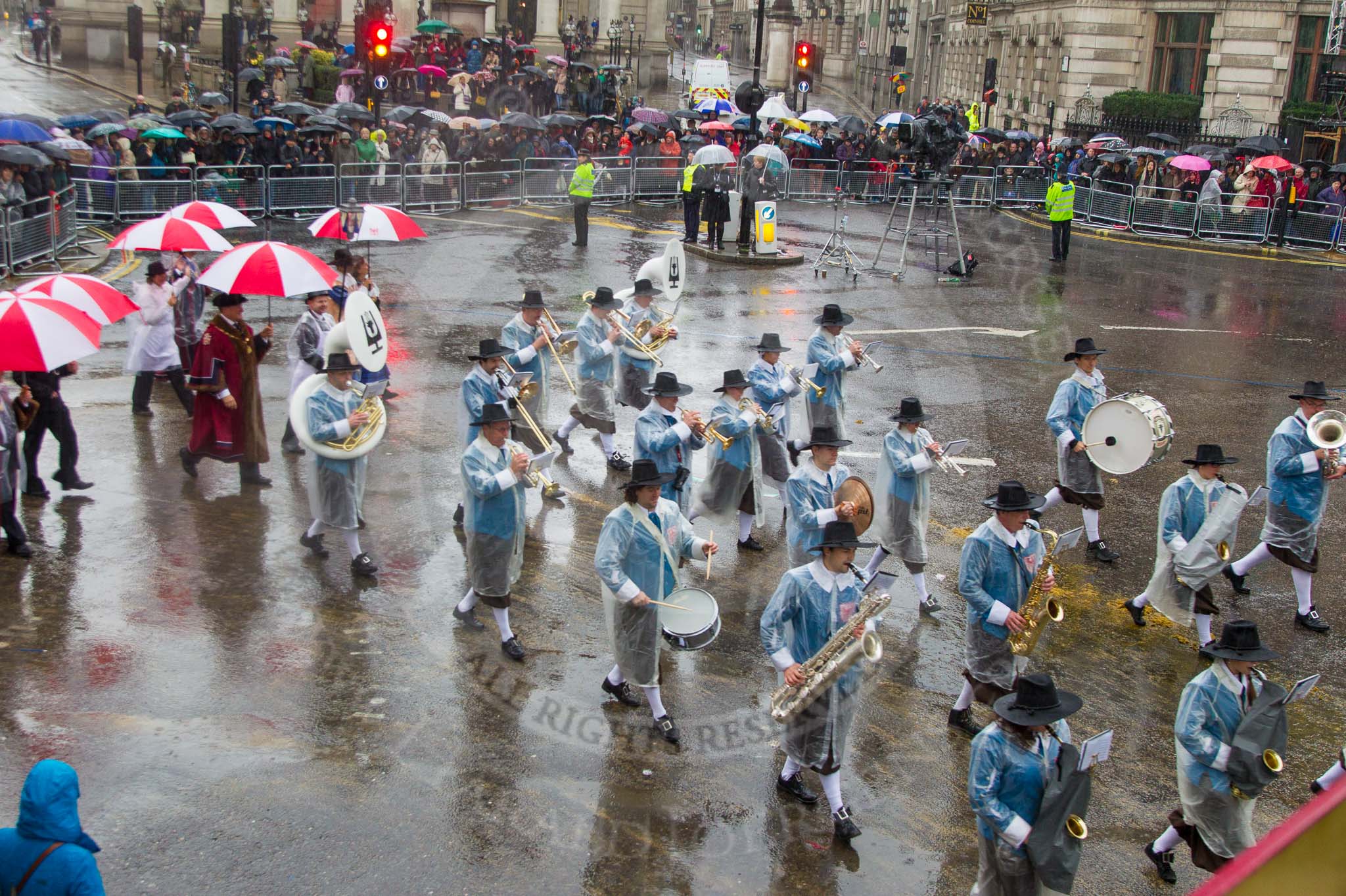 Lord Mayor's Show 2013: 81-Zunft Zur Zimmerleuten Band- the band traditionally supports the Zurich Swiss Gild of the Zimmerleuten in its parade and pageants, and is continuing that tradition today..
Press stand opposite Mansion House, City of London,
London,
Greater London,
United Kingdom,
on 09 November 2013 at 11:45, image #976