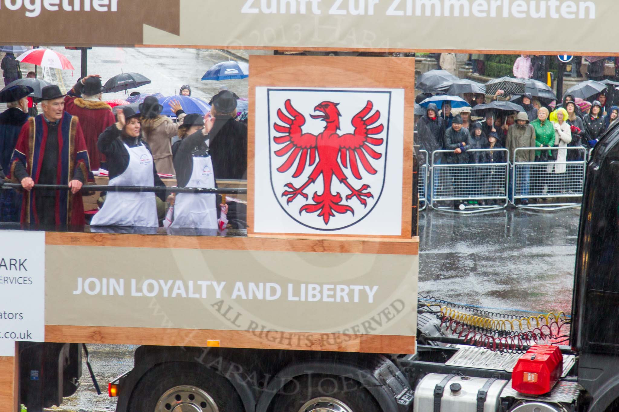 Lord Mayor's Show 2013: 82-Worshipful Company Of Joiners & Ceilers with Zunft Zur Zimmerleuten- the Joiners and Ceilers celebrates its long association with the Swiss Guild of the Zimmerleuten with a troop of horseman and latge contingnet of members in traditional costumes..
Press stand opposite Mansion House, City of London,
London,
Greater London,
United Kingdom,
on 09 November 2013 at 11:46, image #1000