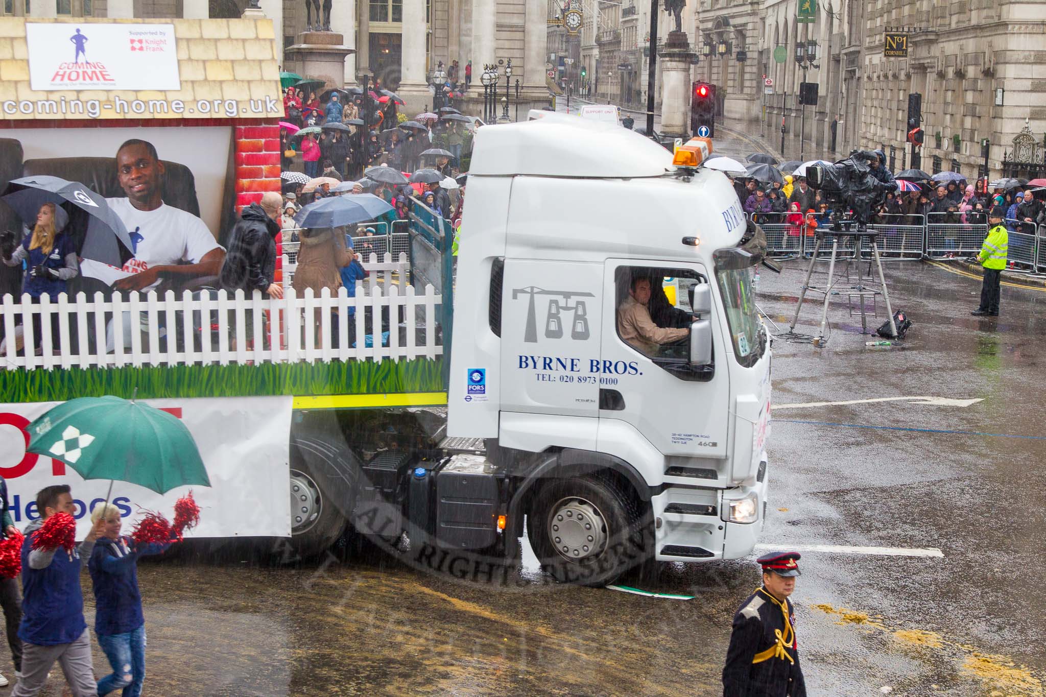 Lord Mayor's Show 2013: 92- Coming Home- is the fundraising campaign for the Haig Housing Trust, which provides housing help for severely wounded heroes.Kindly sponsored by Knight Frank..
Press stand opposite Mansion House, City of London,
London,
Greater London,
United Kingdom,
on 09 November 2013 at 11:50, image #1116