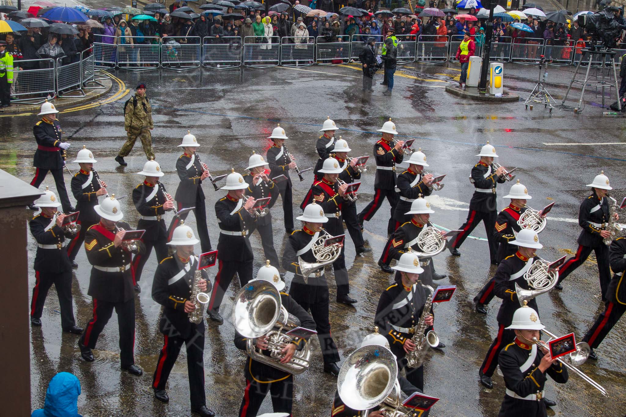 Lord Mayor's Show 2013: 94-Royal Marines Band( HMS Collingwood)-was formed in 2009 and has performed at the Lord Mayor's Show, the Diamong Jubilee, the London 2012 Olympic Games and the subsequent Athlete's Parade..
Press stand opposite Mansion House, City of London,
London,
Greater London,
United Kingdom,
on 09 November 2013 at 11:52, image #1152