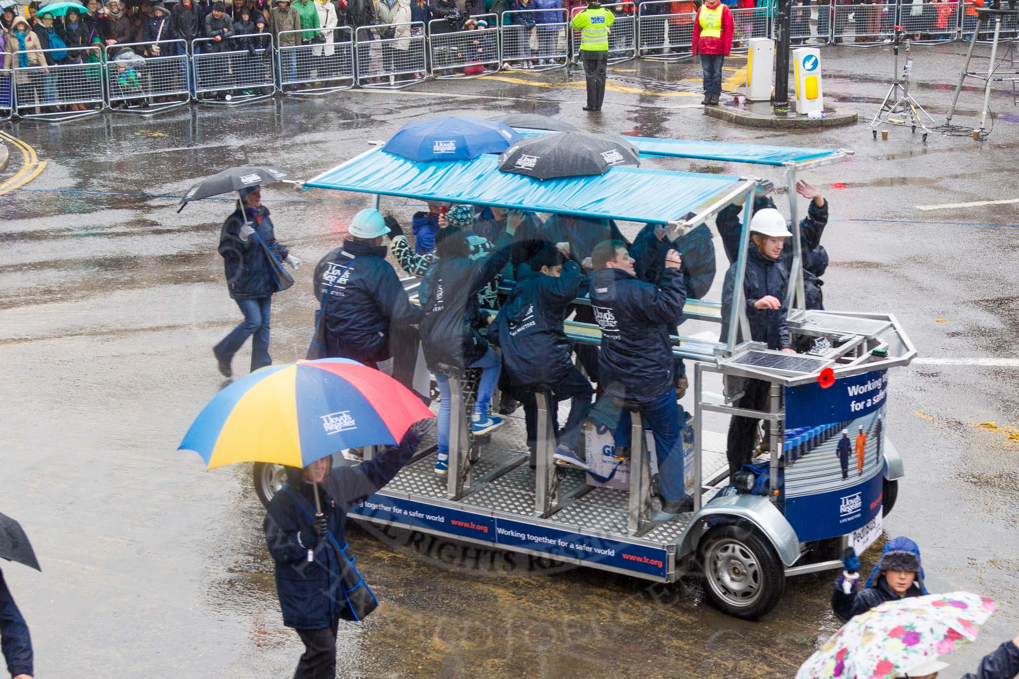 Lord Mayor's Show 2013: 104- Lloyd's Register-was founded in 1760 with a mission to protect life and property and advance research in transportation and engineering..
Press stand opposite Mansion House, City of London,
London,
Greater London,
United Kingdom,
on 09 November 2013 at 11:55, image #1226