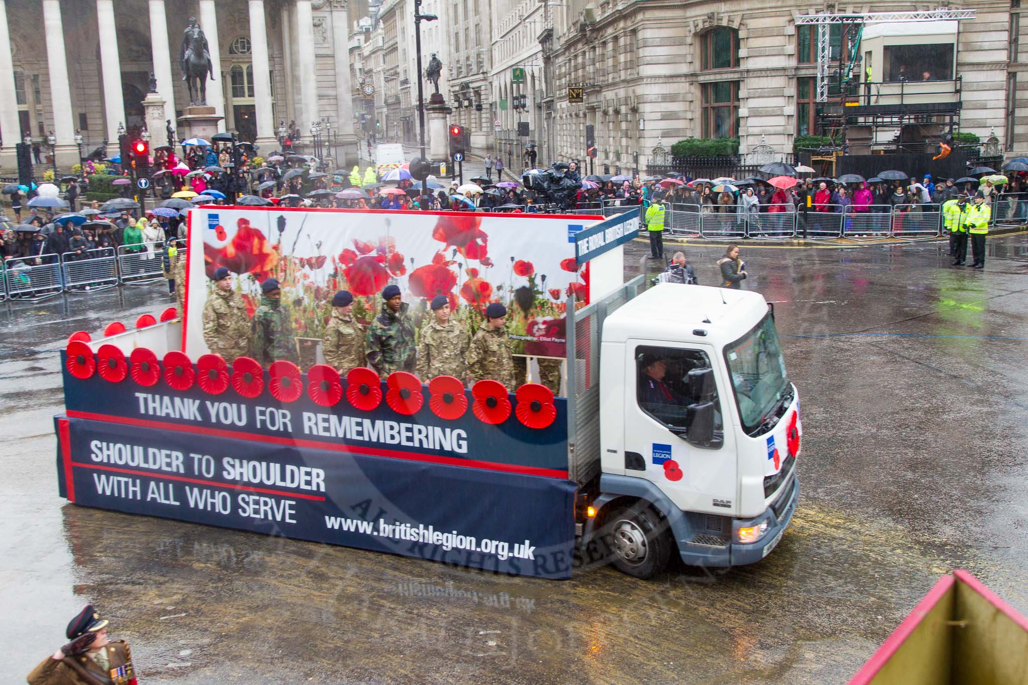 Lord Mayor's Show 2013: 115-Royal British Legion-stands @Shoulder to shoulder with all who serve'..
Press stand opposite Mansion House, City of London,
London,
Greater London,
United Kingdom,
on 09 November 2013 at 12:02, image #1327