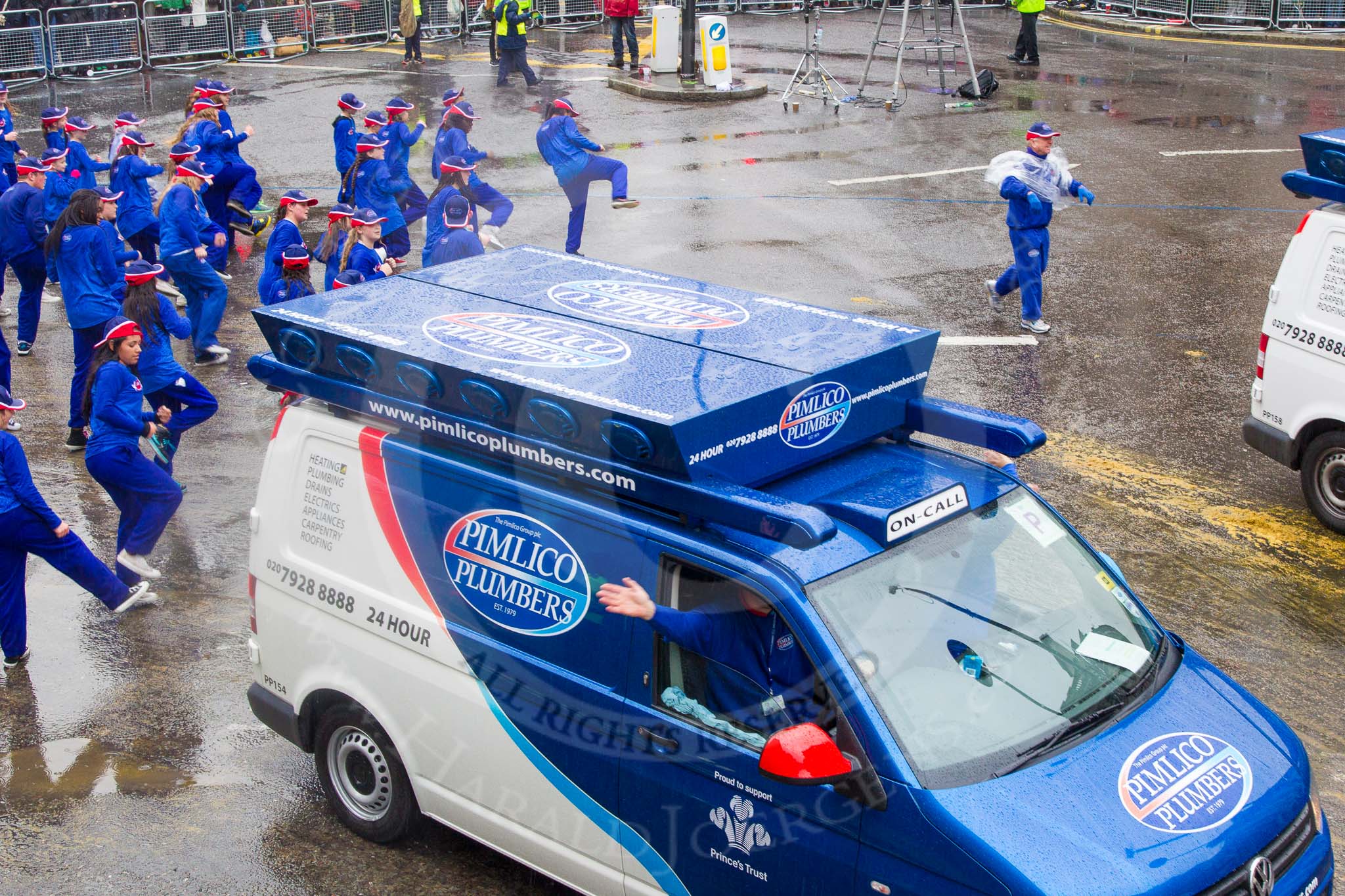 Lord Mayor's Show 2013: 119-Pimlico Plumbers-it is capital's largest independent service company. Pimlico is a Patron of the Prince's Trust. This year they bring a parade of new and vintage vehicles..
Press stand opposite Mansion House, City of London,
London,
Greater London,
United Kingdom,
on 09 November 2013 at 12:03, image #1345