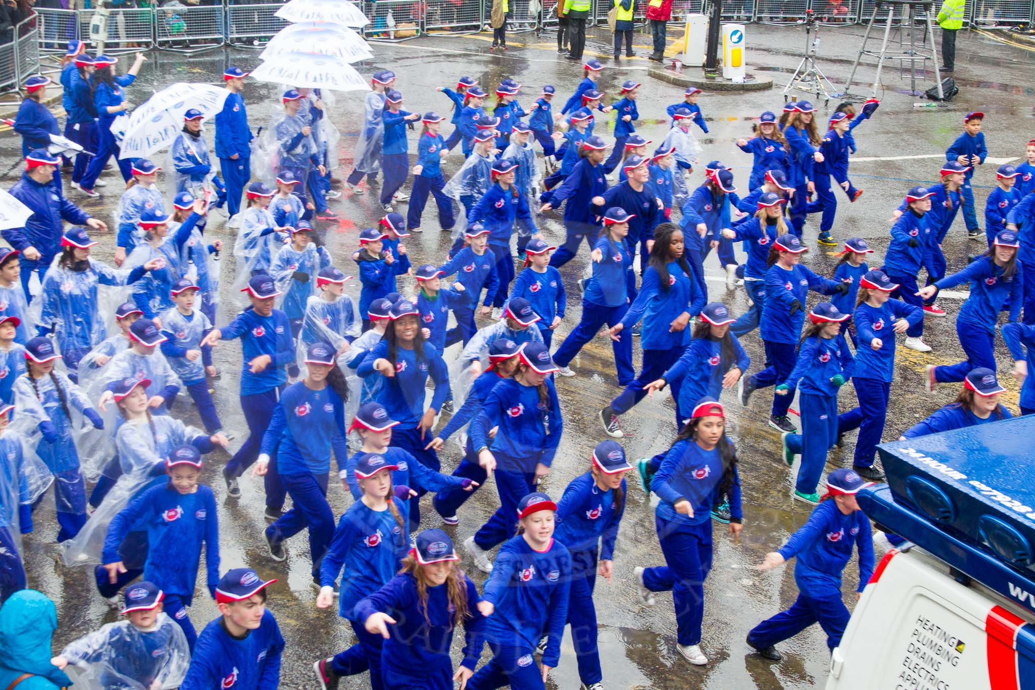 Lord Mayor's Show 2013: 119-Pimlico Plumbers-it is capital's largest independent service company. Pimlico is a Patron of the Prince's Trust. This year they bring a parade of new and vintage vehicles..
Press stand opposite Mansion House, City of London,
London,
Greater London,
United Kingdom,
on 09 November 2013 at 12:04, image #1346