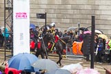 Lord Mayor's Show 2013: Rebecca Jenkins, senior Police Staff Trainer within the City of London Police mounted branch, and Adrian Leppard, Commissioner of the City of London Police, arrive at Mansion House as the sky opens..
Press stand opposite Mansion House, City of London,
London,
Greater London,
United Kingdom,
on 09 November 2013 at 10:47, image #81