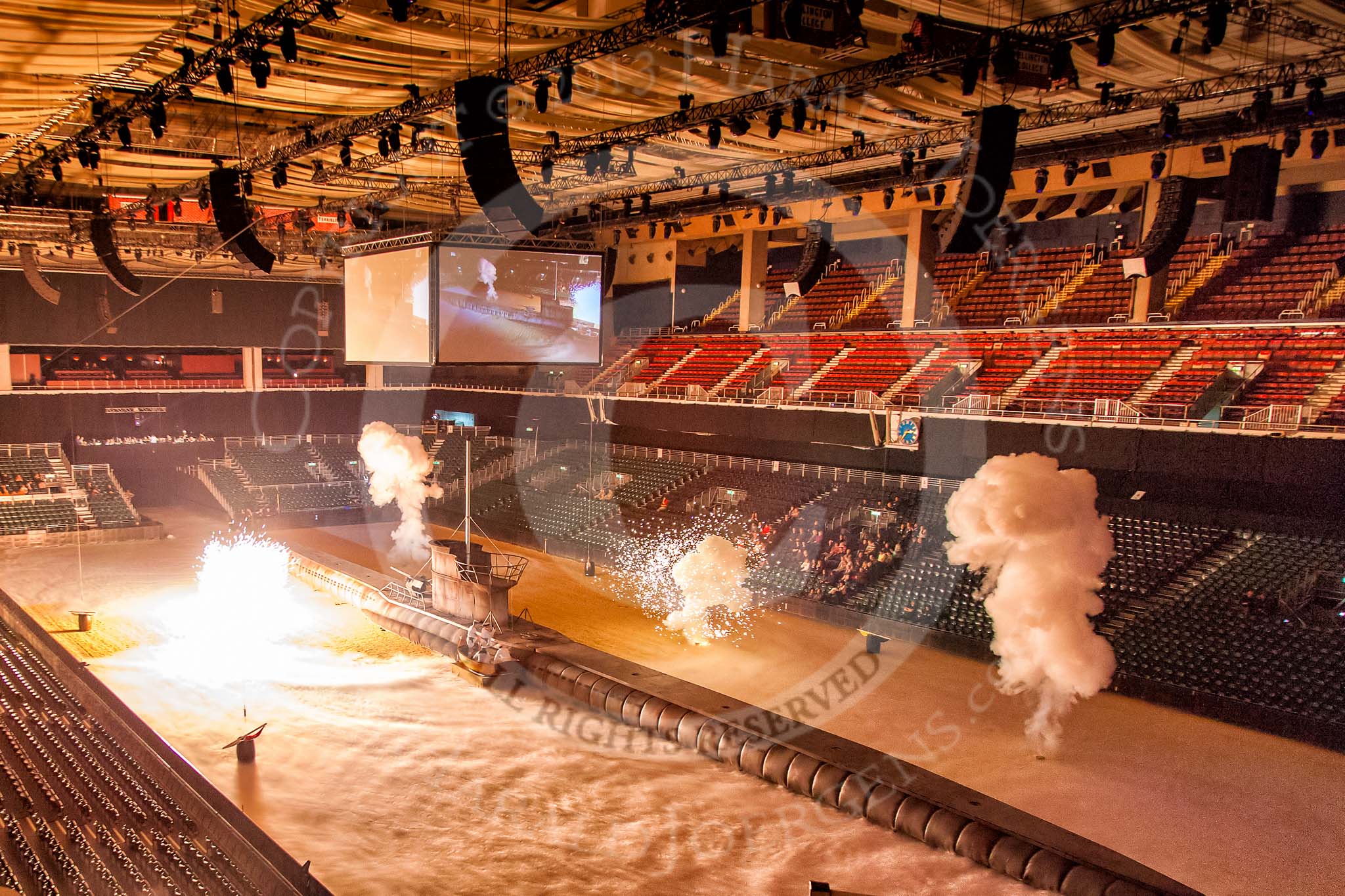 British Military Tournament 2013: Opening the show - explosions as the Royal Navy attacks the German U-Boat..
Earls Court,
London SW5,

United Kingdom,
on 06 December 2013 at 14:36, image #10