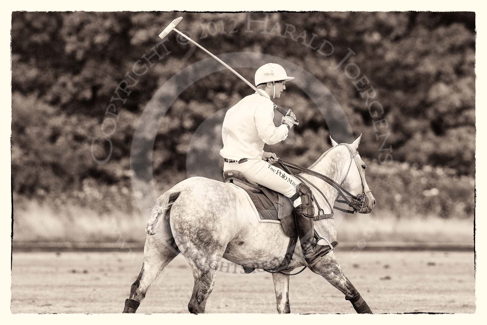 7th Heritage Polo Cup semi-finals: Pedro Harrison with his Best Playing Pony cantering back to centre..
Hurtwood Park Polo Club,
Ewhurst Green,
Surrey,
United Kingdom,
on 04 August 2012 at 15:45, image #274