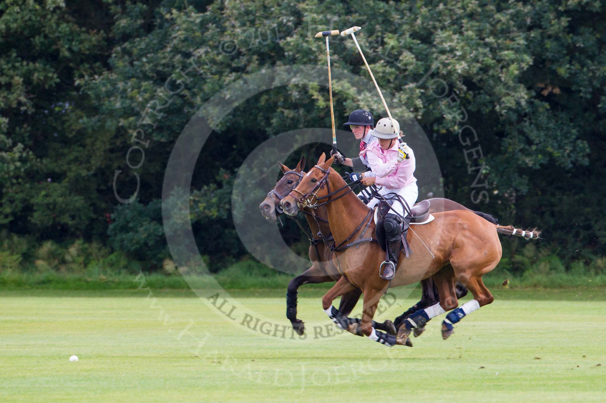 7th Heritage Polo Cup semi-finals: Nico Talamoni playing a nearside shot..
Hurtwood Park Polo Club,
Ewhurst Green,
Surrey,
United Kingdom,
on 04 August 2012 at 11:10, image #19