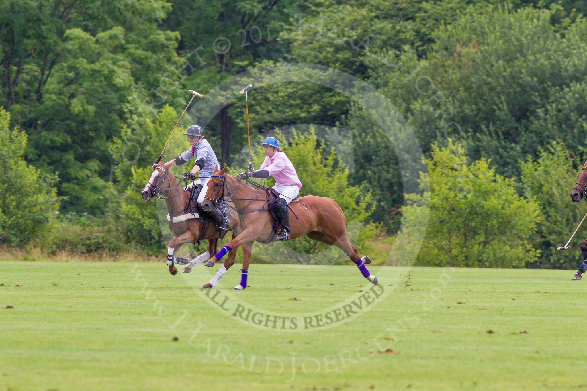 7th Heritage Polo Cup semi-finals: Justo Saveedra, Team Emerging Switzerland, v Henry Fisherr, Team Silver Fox USA..
Hurtwood Park Polo Club,
Ewhurst Green,
Surrey,
United Kingdom,
on 04 August 2012 at 11:33, image #50