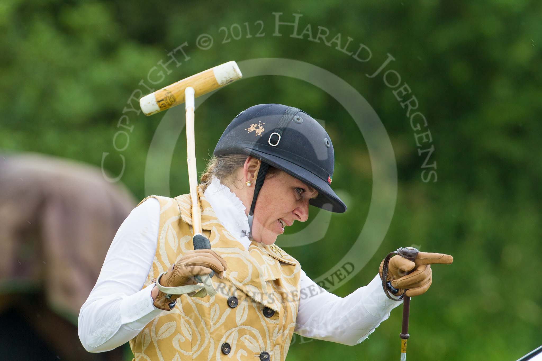 7th Heritage Polo Cup semi-finals: The Amzons of Polo sponsored by Polistas 
Barbara P Zingg pointing at her Pony for the next chukker..
Hurtwood Park Polo Club,
Ewhurst Green,
Surrey,
United Kingdom,
on 04 August 2012 at 13:21, image #131