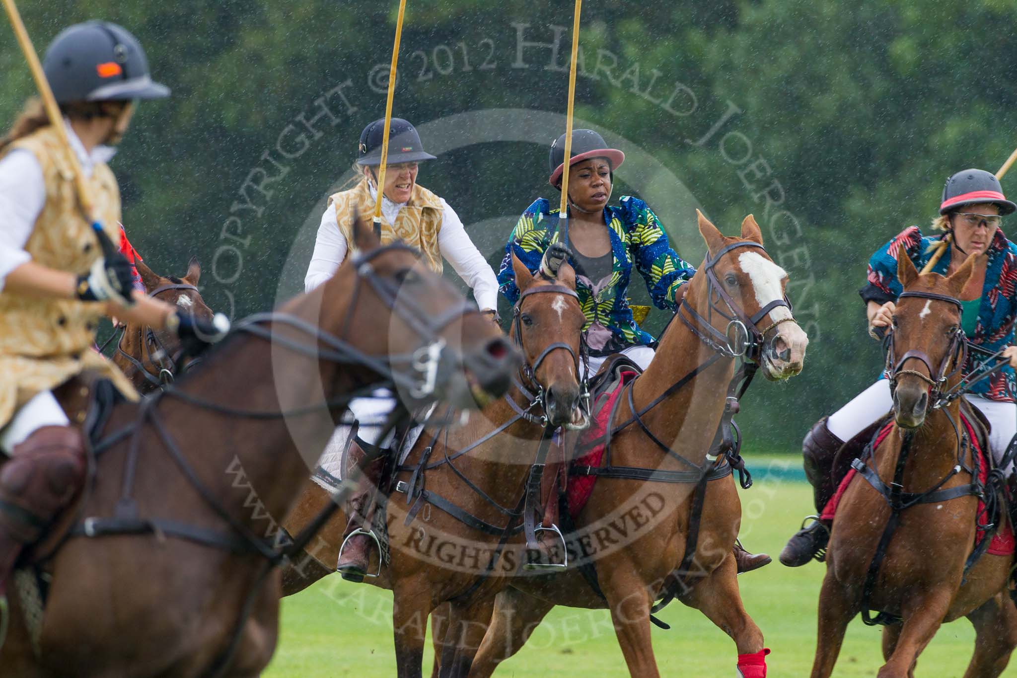 7th Heritage Polo Cup semi-finals: Uneku Atawodi from Nigeria wearing Nigerian Fashion Design DZNY, AMG PETROENERGY Polo Team..
Hurtwood Park Polo Club,
Ewhurst Green,
Surrey,
United Kingdom,
on 04 August 2012 at 14:04, image #195