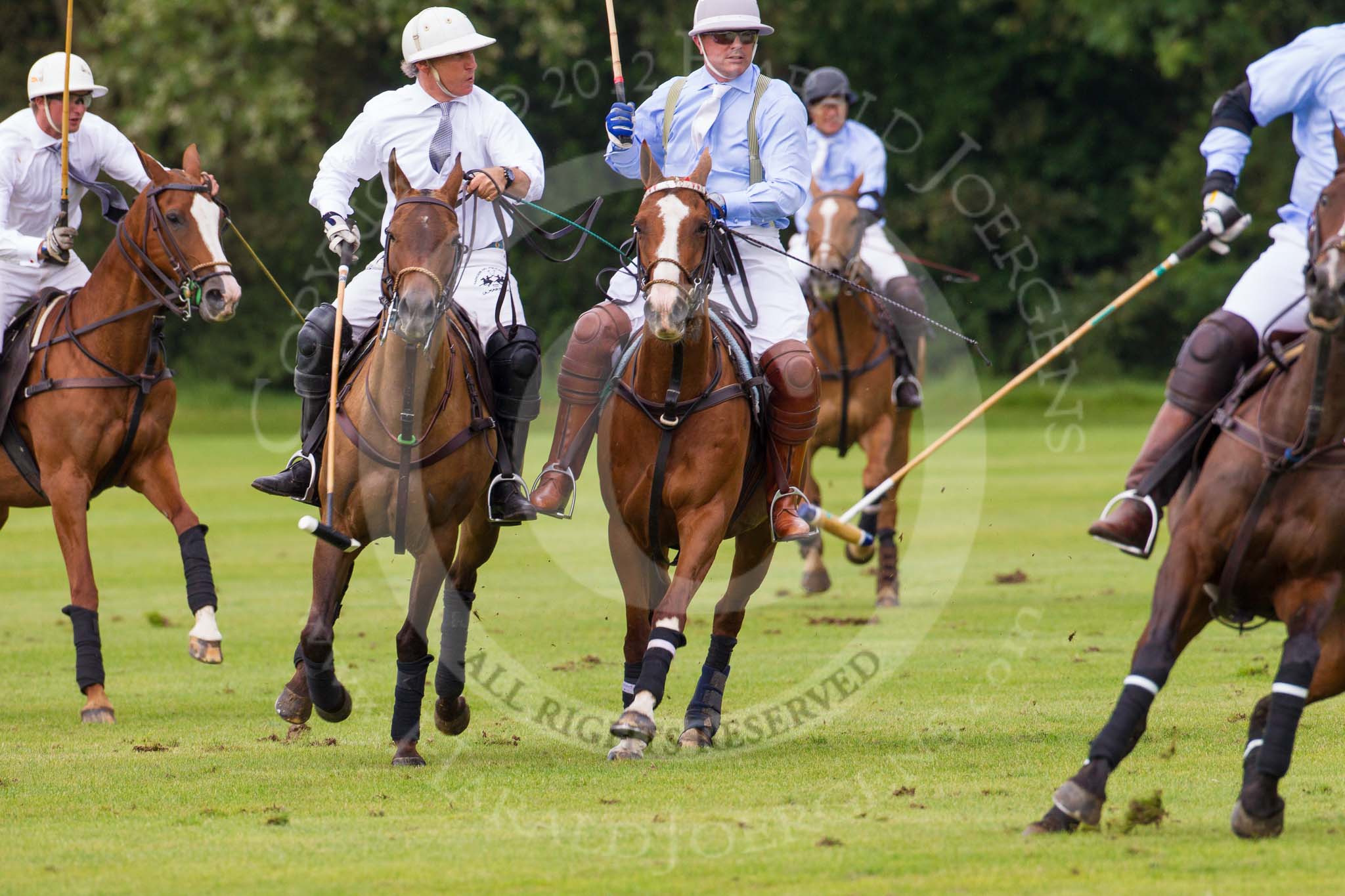 7th Heritage Polo Cup semi-finals: Paul Oberschneider La Golondrina riding along side Timothy Rose La Mariposa..
Hurtwood Park Polo Club,
Ewhurst Green,
Surrey,
United Kingdom,
on 04 August 2012 at 15:56, image #302