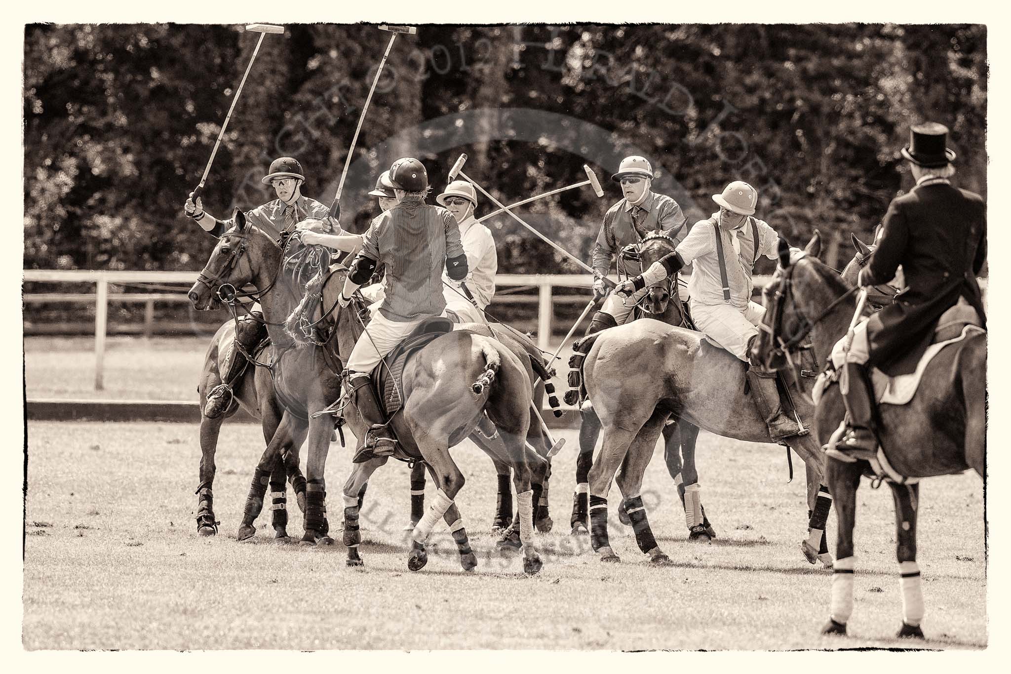 7th Heritage Polo Cup finals: Umpire Oli Hipwood observing all Players in protest..
Hurtwood Park Polo Club,
Ewhurst Green,
Surrey,
United Kingdom,
on 05 August 2012 at 14:10, image #68