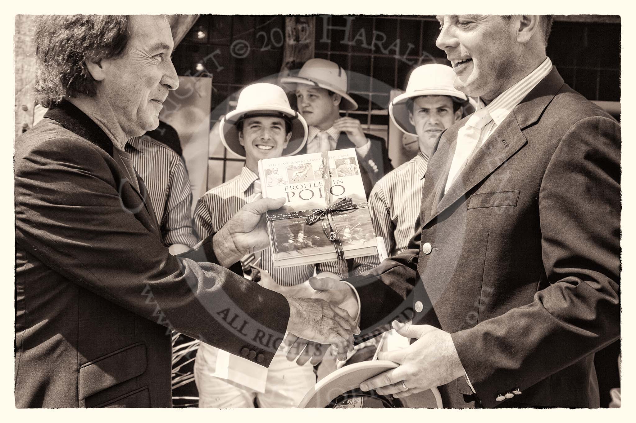 7th Heritage Polo Cup finals: Kenny Jones to present Timothy Blacklocks Book & Print Shop 
"Profiles in Polo" to Timothy Rose..
Hurtwood Park Polo Club,
Ewhurst Green,
Surrey,
United Kingdom,
on 05 August 2012 at 14:45, image #109