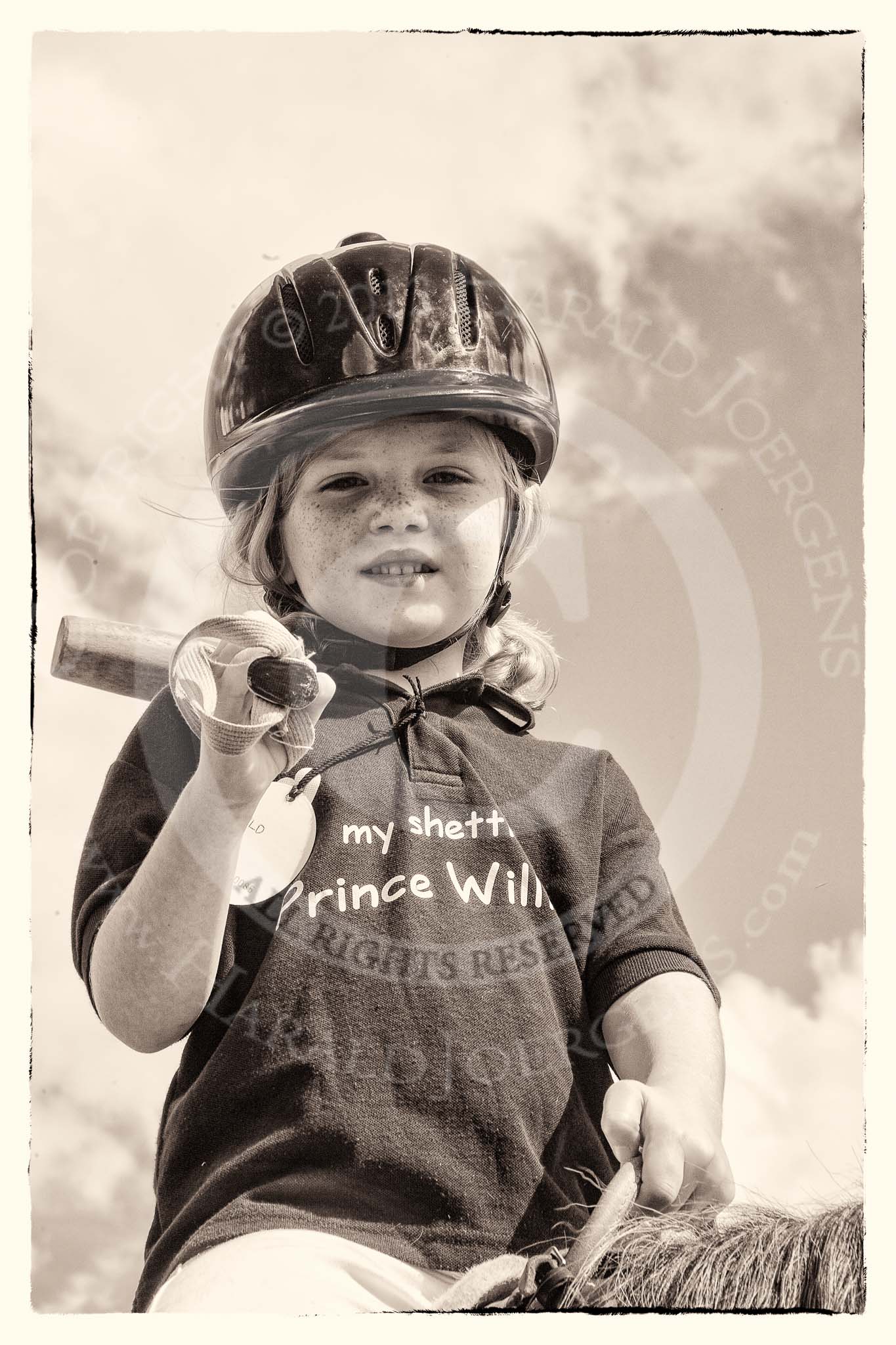 7th Heritage Polo Cup finals: Shetland Pony Club, www.shetlandponyclub.co.uk..
Hurtwood Park Polo Club,
Ewhurst Green,
Surrey,
United Kingdom,
on 05 August 2012 at 14:50, image #115