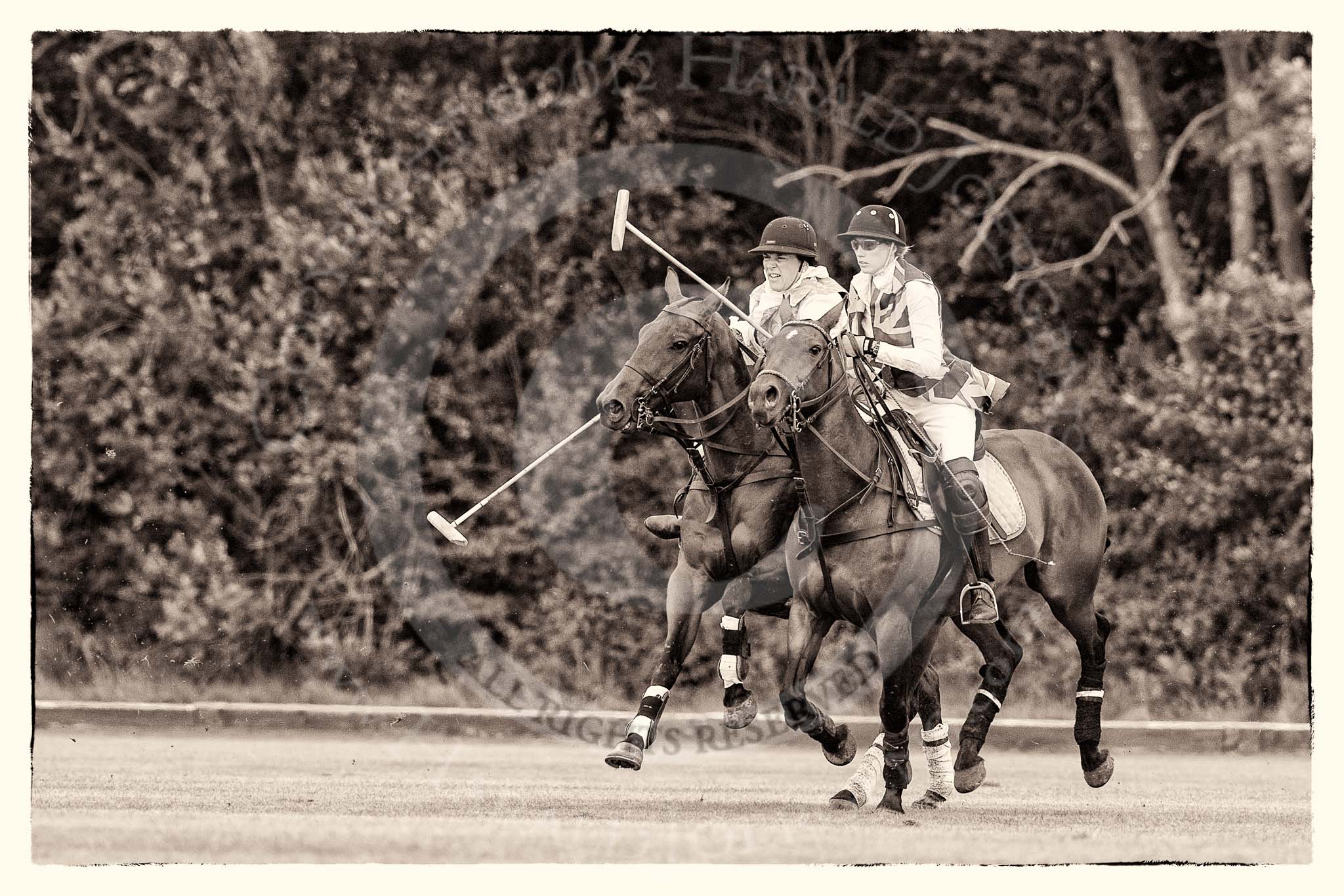 7th Heritage Polo Cup finals: Leigh Fisher being ridden off by Barbara P Zingg..
Hurtwood Park Polo Club,
Ewhurst Green,
Surrey,
United Kingdom,
on 05 August 2012 at 15:15, image #134