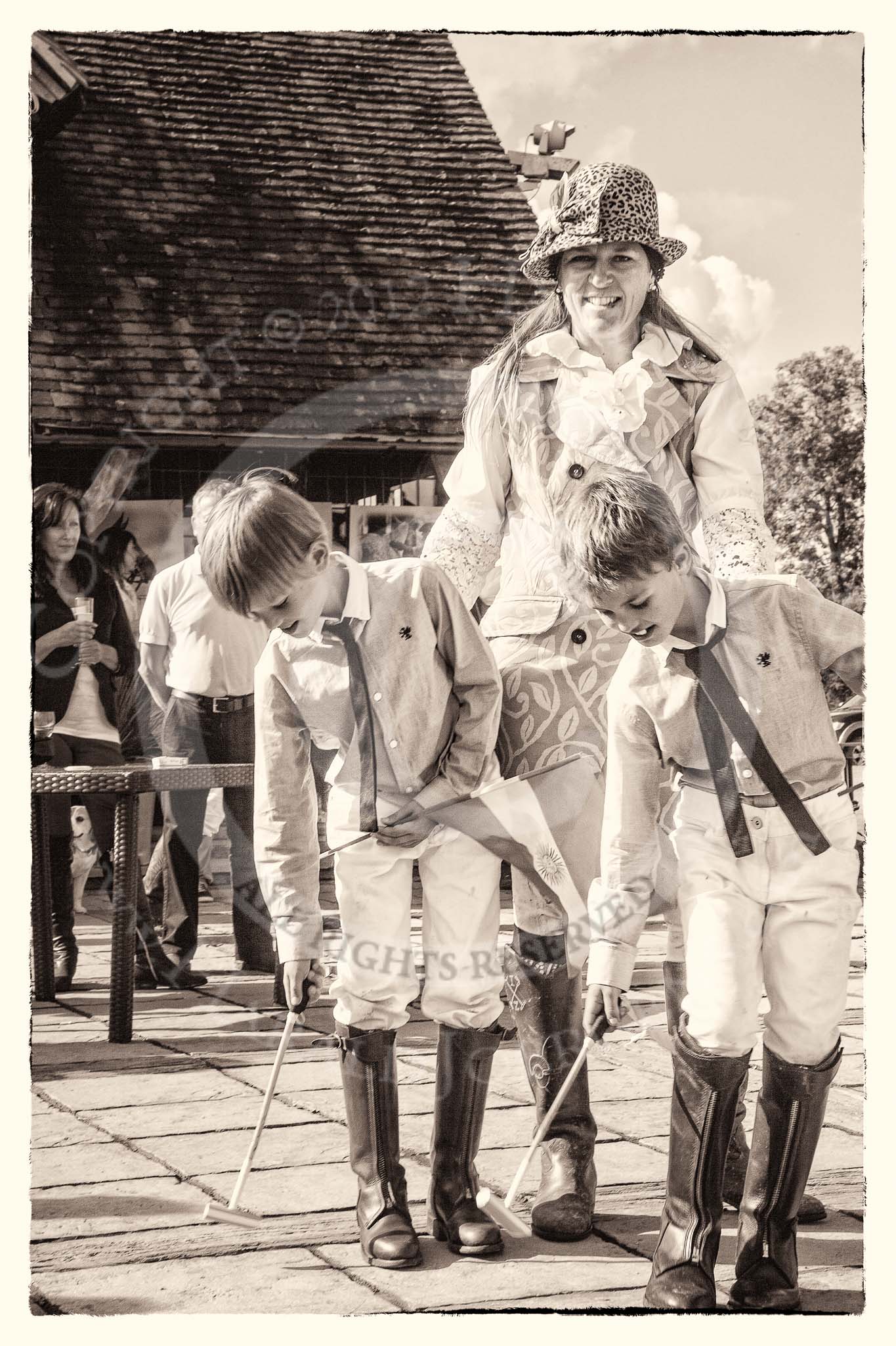 7th Heritage Polo Cup finals: La Golondrina Argentina  Exhibition of Stick & Ball Presentation Jose Riglos jr & Christian Oberschneider jr (8 years old)..
Hurtwood Park Polo Club,
Ewhurst Green,
Surrey,
United Kingdom,
on 05 August 2012 at 17:03, image #261