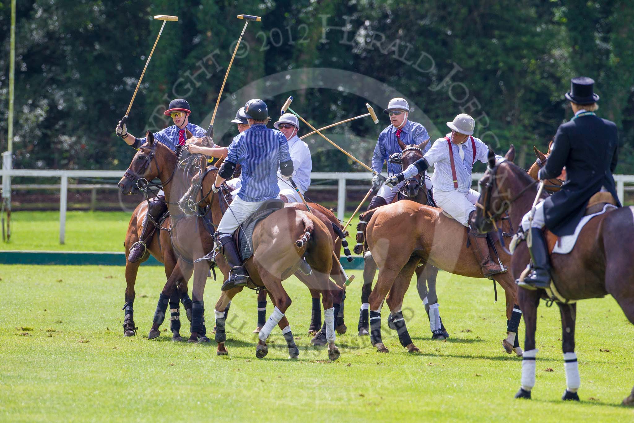 7th Heritage Polo Cup finals: Umpire Oli Hipwood observing all Players in protest..
Hurtwood Park Polo Club,
Ewhurst Green,
Surrey,
United Kingdom,
on 05 August 2012 at 14:10, image #68