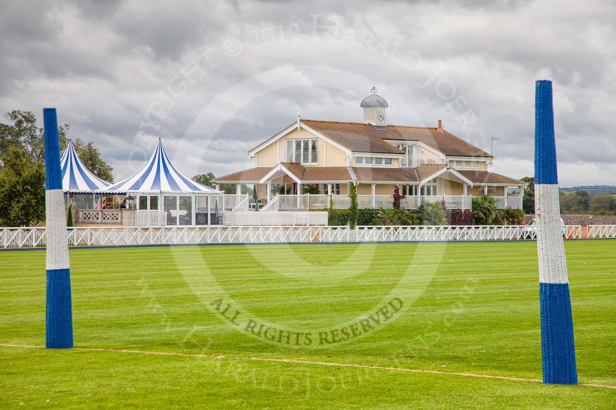 DBPC Polo in the Park 2012: The clubhouse seen from the goal line of the blue pitch on the Western side of the grounds..
Dallas Burston Polo Club,
Stoneythorpe Estate,
Southam,
Warwickshire,
United Kingdom,
on 16 September 2012 at 09:45, image #13