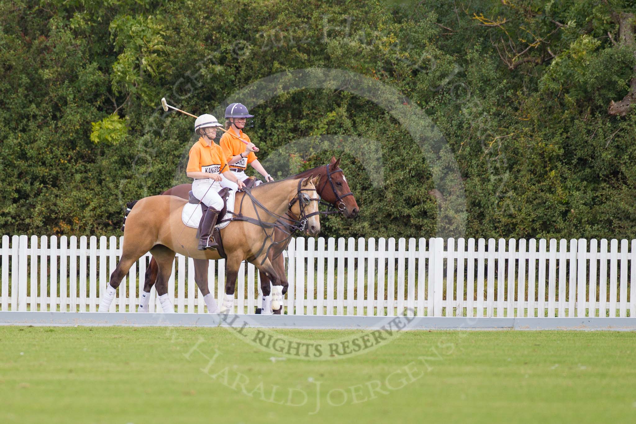 DBPC Polo in the Park 2012: Getting ready for the first match - Kangaroos team players Jane Kang and Amy Harper..
Dallas Burston Polo Club,
Stoneythorpe Estate,
Southam,
Warwickshire,
United Kingdom,
on 16 September 2012 at 10:03, image #26