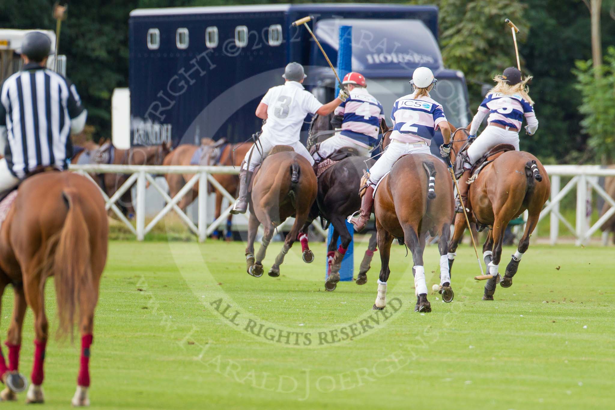 DBPC Polo in the Park 2012: Rated People Polo Team #3, Alex Vent, and JCS #4, Sebastian Funes, #2, Louise Coulbeck, and #3, Emma Nicolson..
Dallas Burston Polo Club,
Stoneythorpe Estate,
Southam,
Warwickshire,
United Kingdom,
on 16 September 2012 at 11:04, image #70