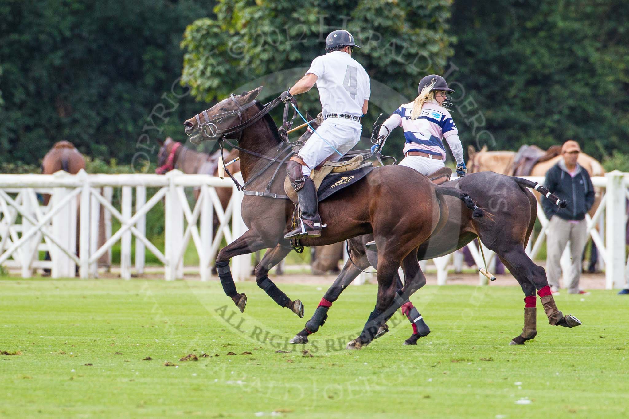 DBPC Polo in the Park 2012: Rated People Polo Team #4, Johnny Johnny Moreland-Lynn, and JCS #3, Emma Nicolson..
Dallas Burston Polo Club,
Stoneythorpe Estate,
Southam,
Warwickshire,
United Kingdom,
on 16 September 2012 at 11:14, image #73