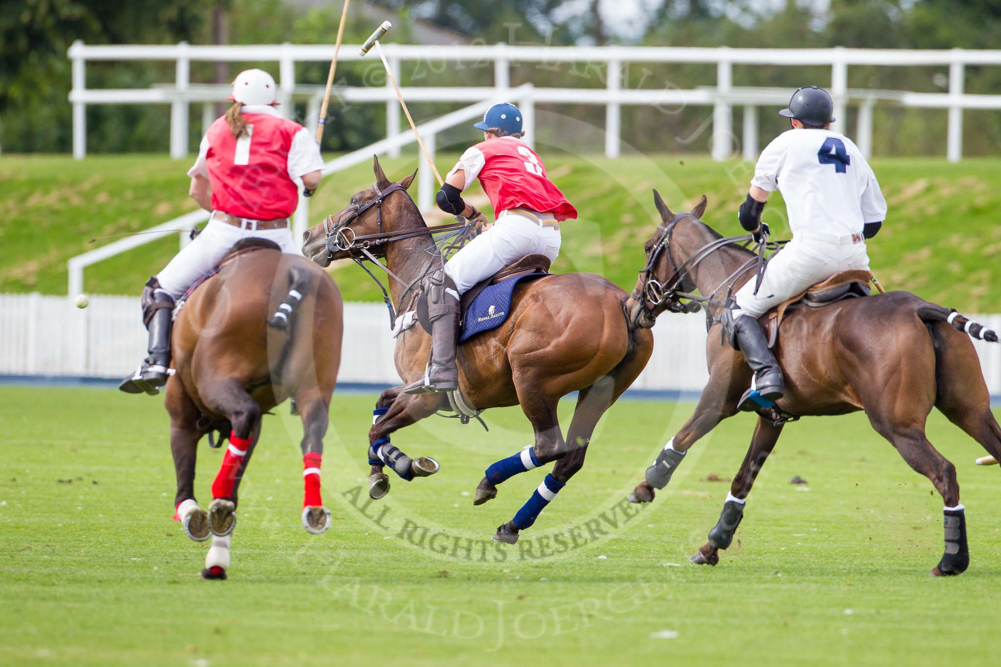 DBPC Polo in the Park 2012: Phoenix Polo Team #1, Molly Davies., #3, Tomy Iriarte, and Rathbones #4, Henry Browne..
Dallas Burston Polo Club,
Stoneythorpe Estate,
Southam,
Warwickshire,
United Kingdom,
on 16 September 2012 at 11:49, image #106