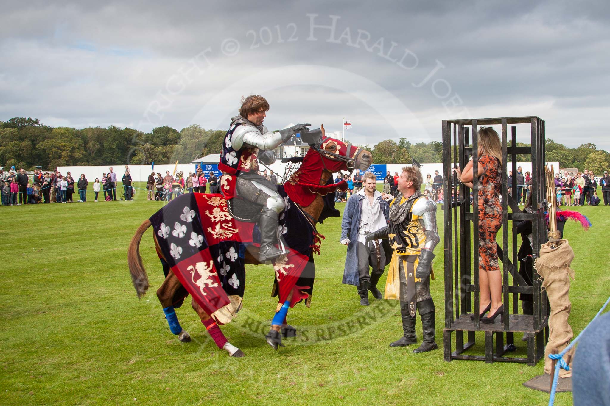 DBPC Polo in the Park 2012: The Knights of Middle England and their Jousting display - here with their "hostage", Dallas Burston Polo Club VIP guest Jade Watts..
Dallas Burston Polo Club,
Stoneythorpe Estate,
Southam,
Warwickshire,
United Kingdom,
on 16 September 2012 at 14:33, image #199