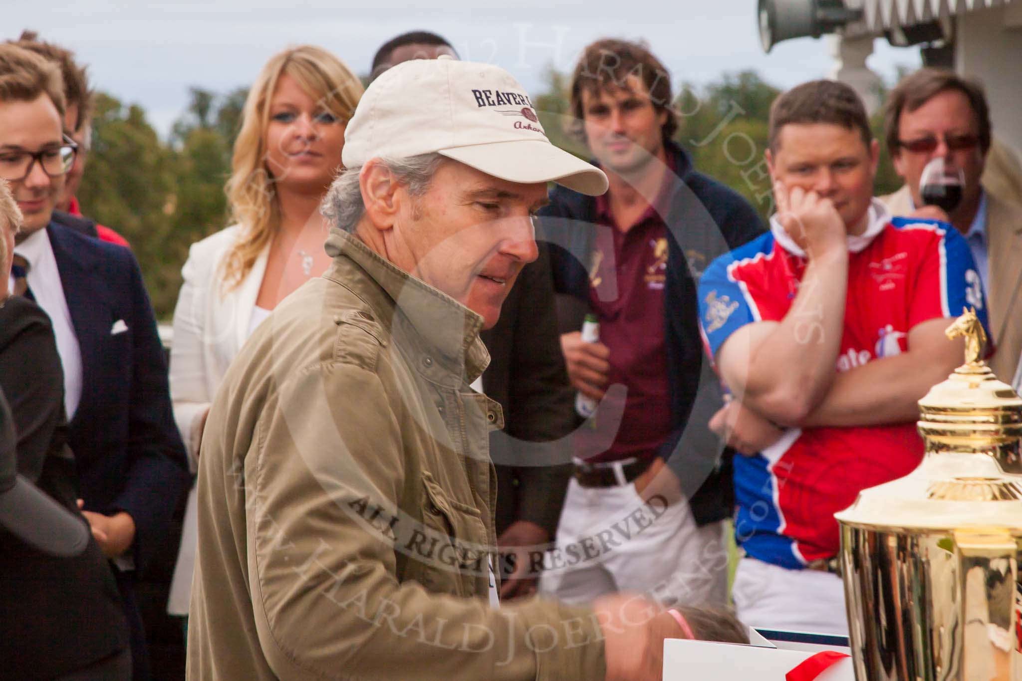 DBPC Polo in the Park 2012: Paul Oberschneider, patron of the La Golondrina polo team that won the  Dallas Burston Gold Cup Tournament..
Dallas Burston Polo Club,
Stoneythorpe Estate,
Southam,
Warwickshire,
United Kingdom,
on 16 September 2012 at 18:11, image #308