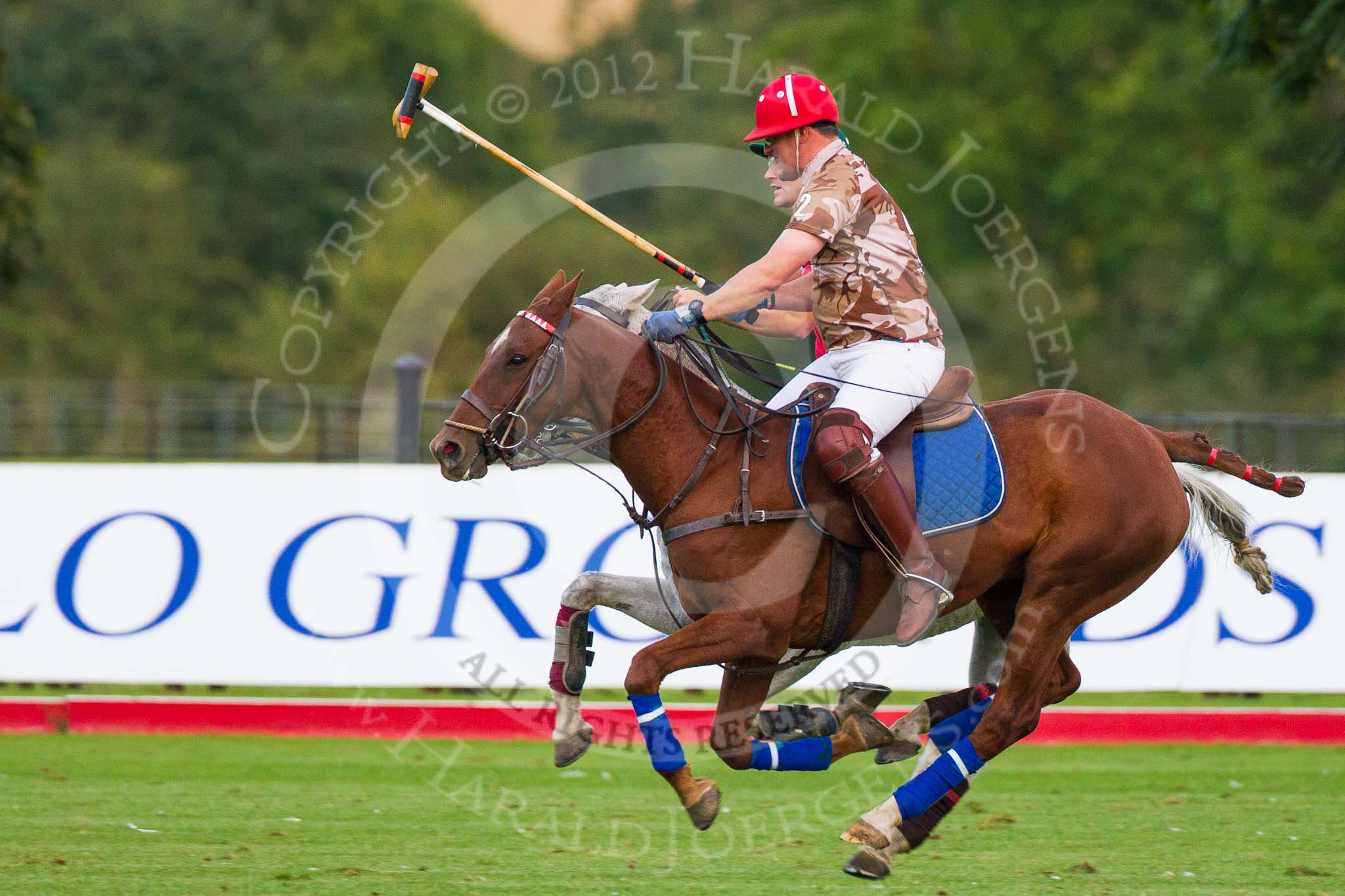 DBPC Polo in the Park 2012: In perfect harmony - Royal Artillery #2, Major Andy Wood, and DBPC #2, Captain Willim Mawby..
Dallas Burston Polo Club,
Stoneythorpe Estate,
Southam,
Warwickshire,
United Kingdom,
on 16 September 2012 at 18:35, image #325