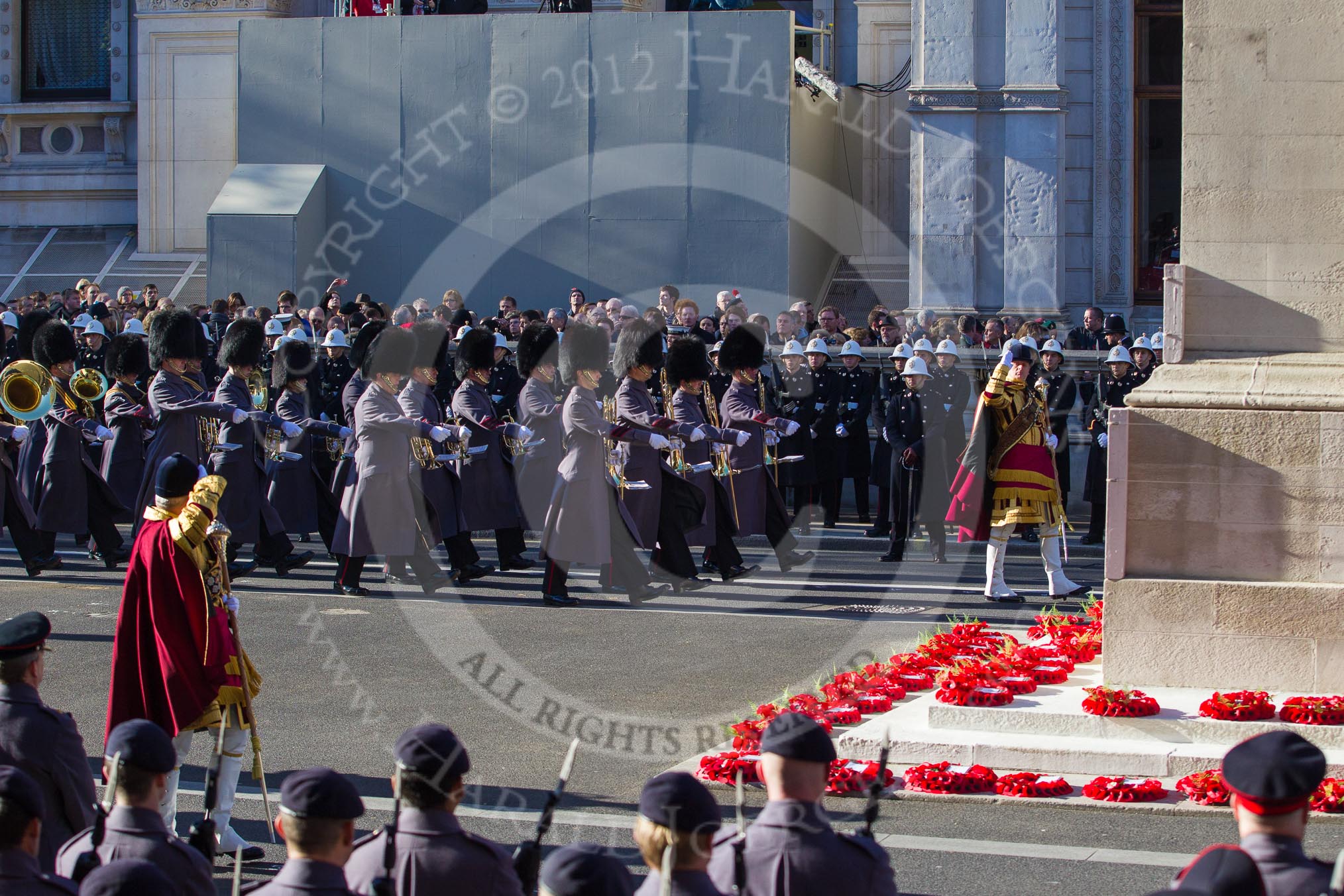 Remembrance Sunday 2012 Cenotaph March Past: The Massed Bands are marching along the Cenotaph, the Drum Majors saluting..
Whitehall, Cenotaph,
London SW1,

United Kingdom,
on 11 November 2012 at 11:31, image #25