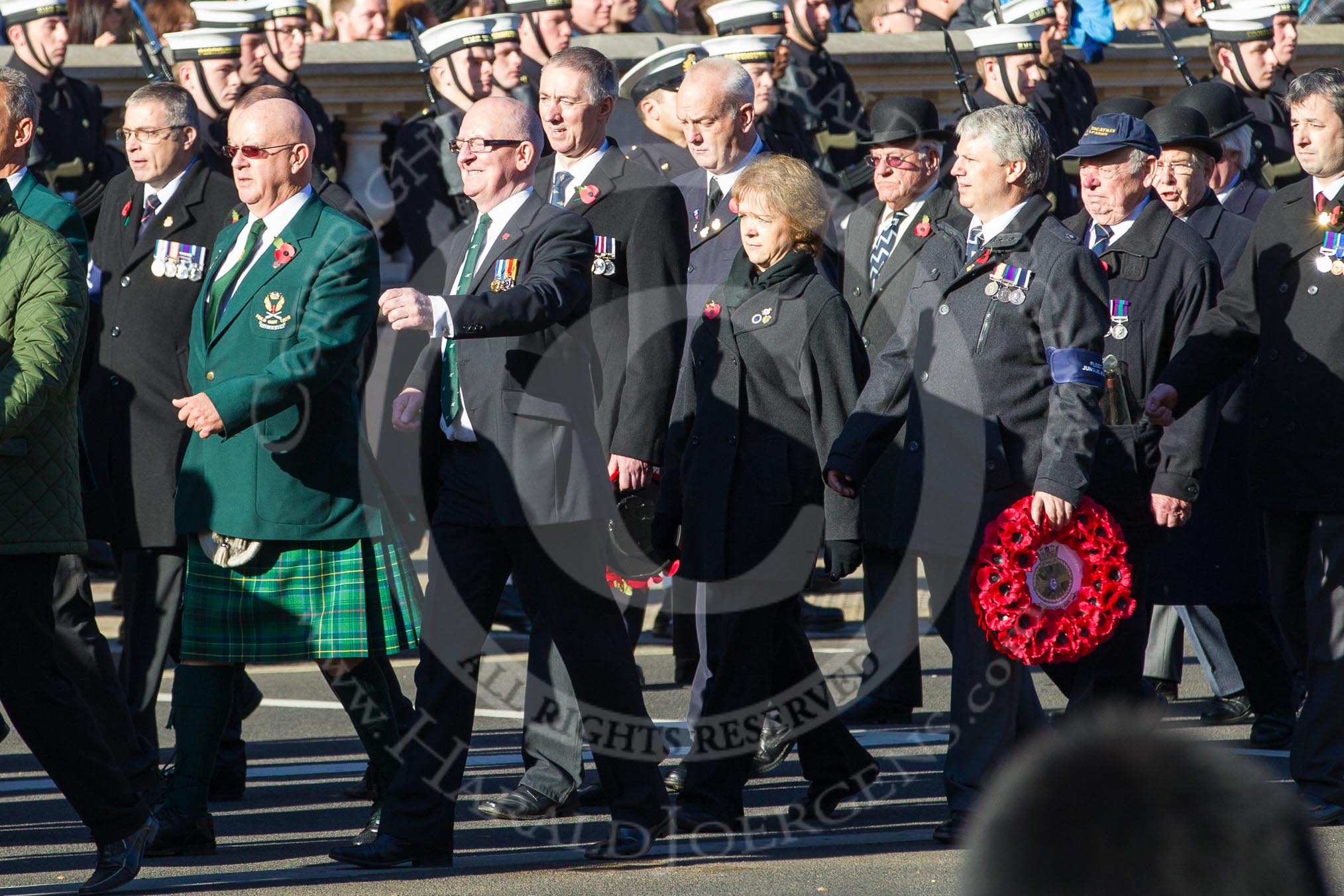 Remembrance Sunday 2012 Cenotaph March Past: Group E12 - Fleet Air Arm Junglie Association.
Whitehall, Cenotaph,
London SW1,

United Kingdom,
on 11 November 2012 at 11:39, image #104