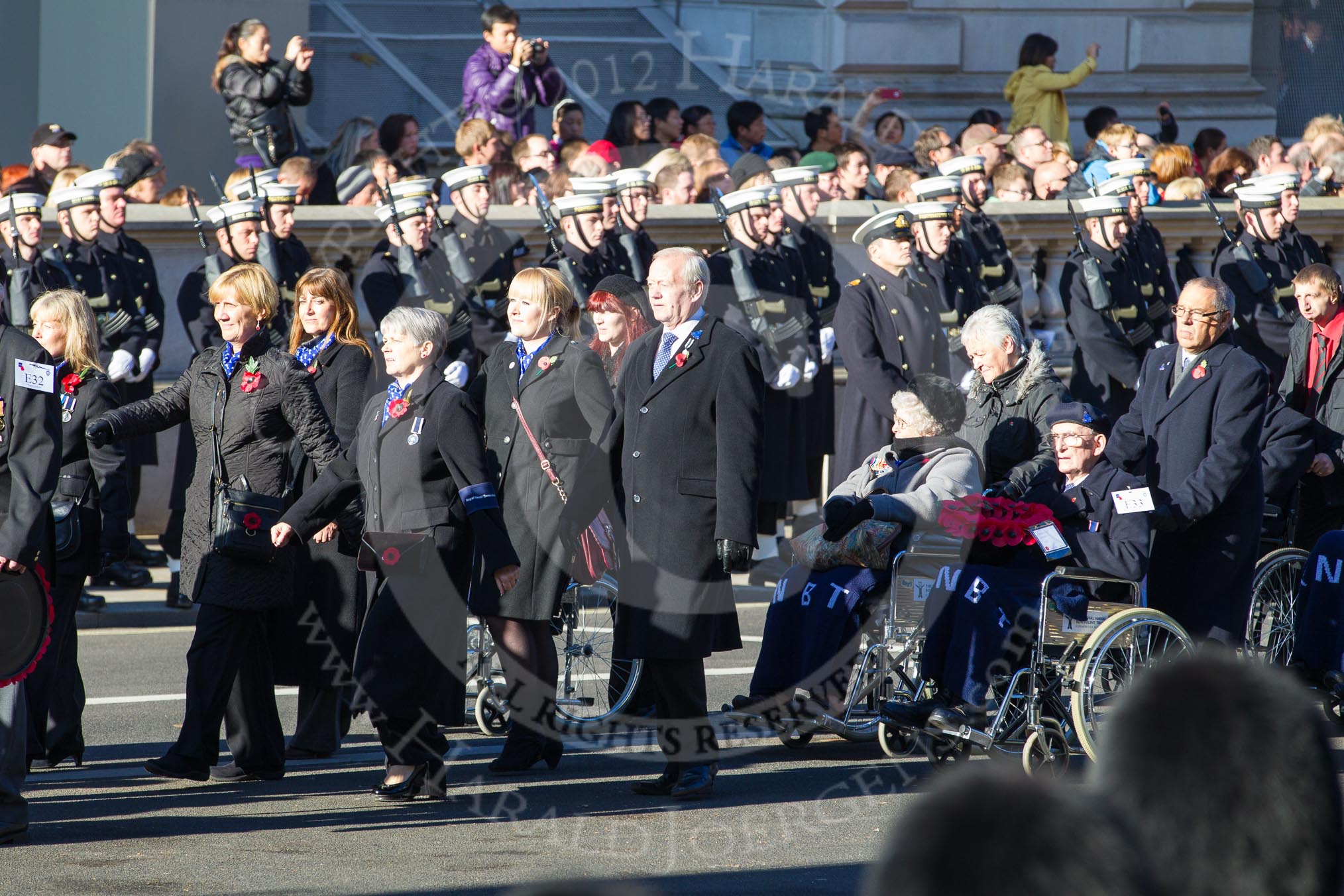 Remembrance Sunday 2012 Cenotaph March Past: Group E32 - Royal Naval Medical Branch Ratings & Sick Berth Staff Association and E33 - Royal Naval Benevolent Trust..
Whitehall, Cenotaph,
London SW1,

United Kingdom,
on 11 November 2012 at 11:41, image #236