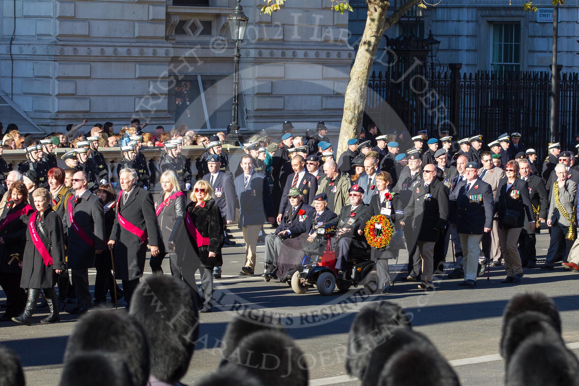 Remembrance Sunday 2012 Cenotaph March Past: Group F14 - National Pigeon War Service and F15 - National Gulf Veterans & Families Association..
Whitehall, Cenotaph,
London SW1,

United Kingdom,
on 11 November 2012 at 11:47, image #498