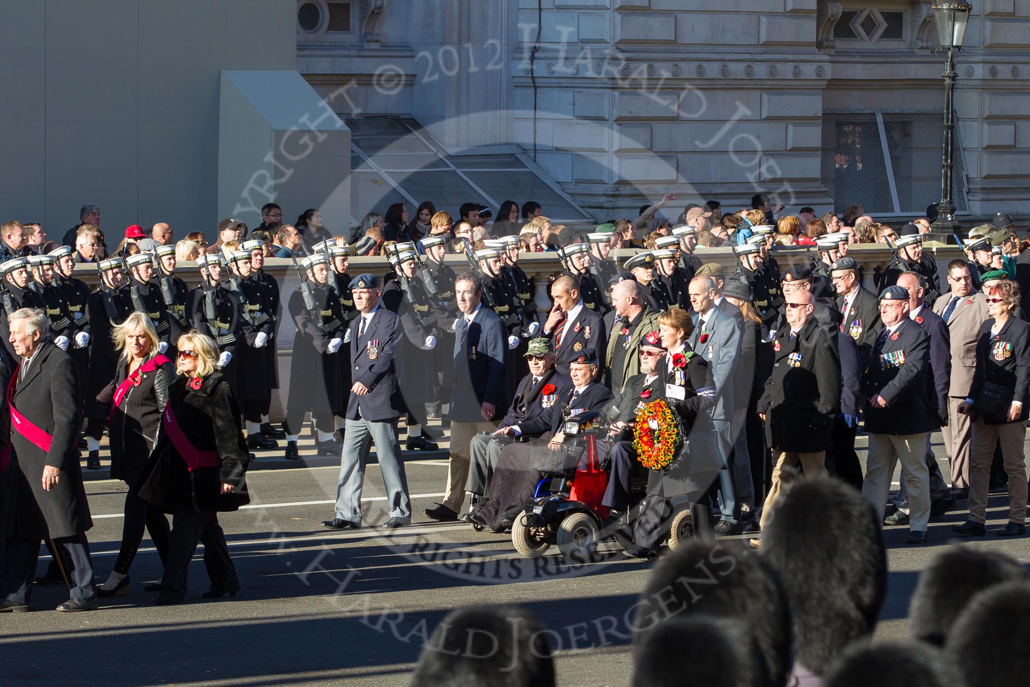 Remembrance Sunday 2012 Cenotaph March Past: Group F14 - National Pigeon War Service and F15 - National Gulf Veterans & Families Association..
Whitehall, Cenotaph,
London SW1,

United Kingdom,
on 11 November 2012 at 11:47, image #508