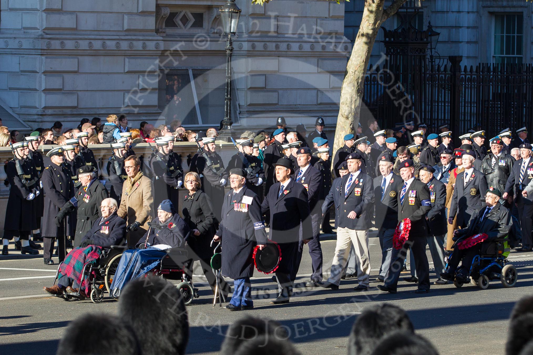 Remembrance Sunday 2012 Cenotaph March Past: Group F18 - Far East Prisoners of War and F19 - British Veterans Group..
Whitehall, Cenotaph,
London SW1,

United Kingdom,
on 11 November 2012 at 11:48, image #545
