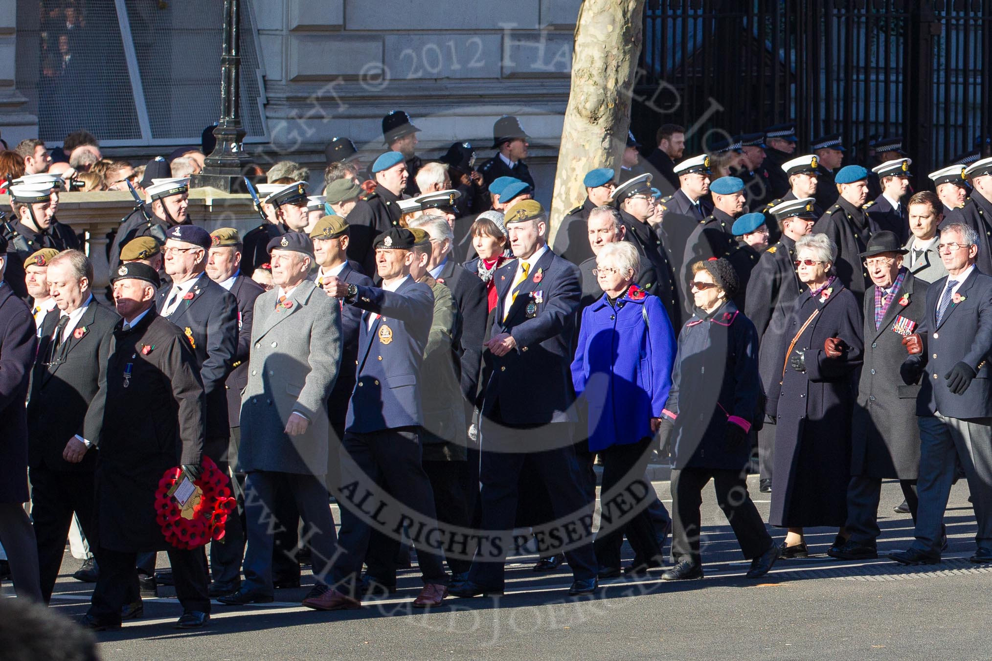 Remembrance Sunday 2012 Cenotaph March Past: Group A1/2/3 - Princess of Wales's Royal Regiment/Prince of Wales's Leinster Regiment (Royal Canadians) Regimental Association/Royal East Kent Regiment (The Buffs) Past & Present Association..
Whitehall, Cenotaph,
London SW1,

United Kingdom,
on 11 November 2012 at 11:48, image #559