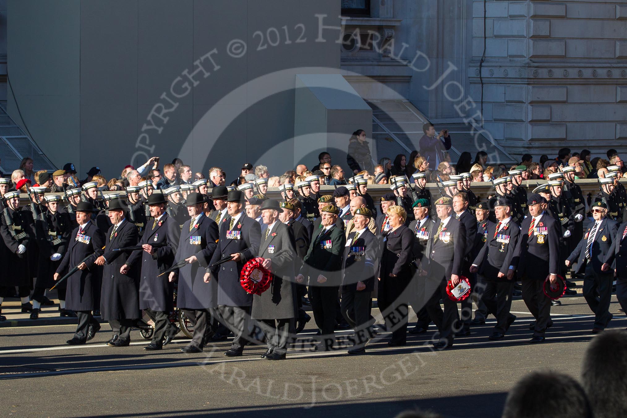 Remembrance Sunday 2012 Cenotaph March Past: Group A9 - Green Howards Association, A10 - Duke of Wellington's Regiment, and 11 - Cheshire Regiment Association..
Whitehall, Cenotaph,
London SW1,

United Kingdom,
on 11 November 2012 at 11:49, image #601