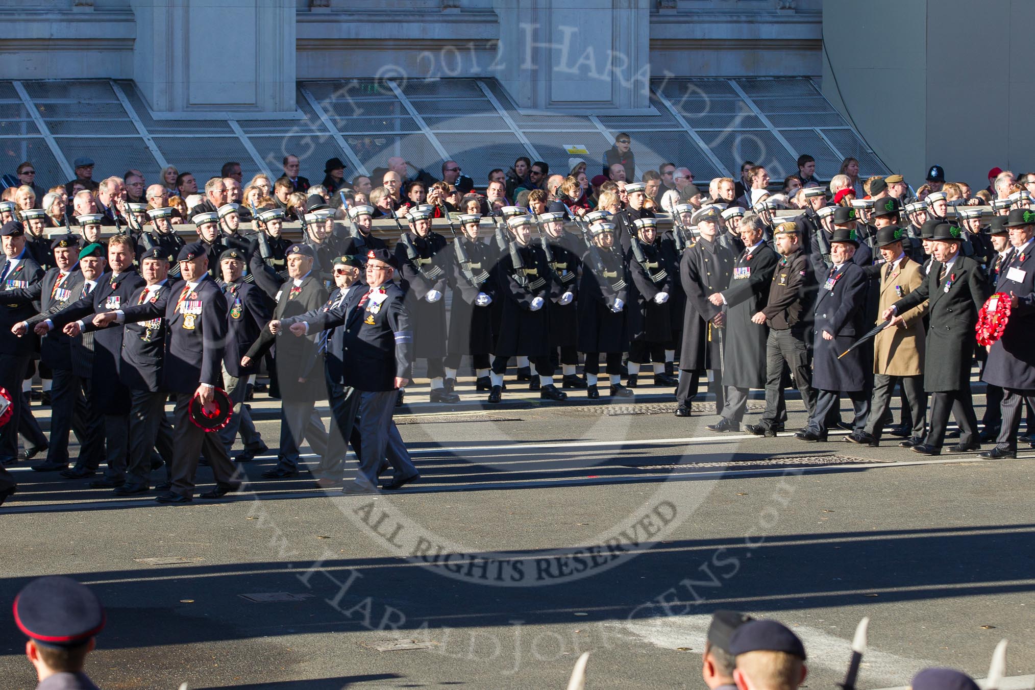 Remembrance Sunday 2012 Cenotaph March Past: Group A9 - Green Howards Association, A10 - Duke of Wellington's Regiment, A11 - Cheshire Regiment Association., and A12 - Sherwood Foresters & Worcestershire Regiment..
Whitehall, Cenotaph,
London SW1,

United Kingdom,
on 11 November 2012 at 11:49, image #612