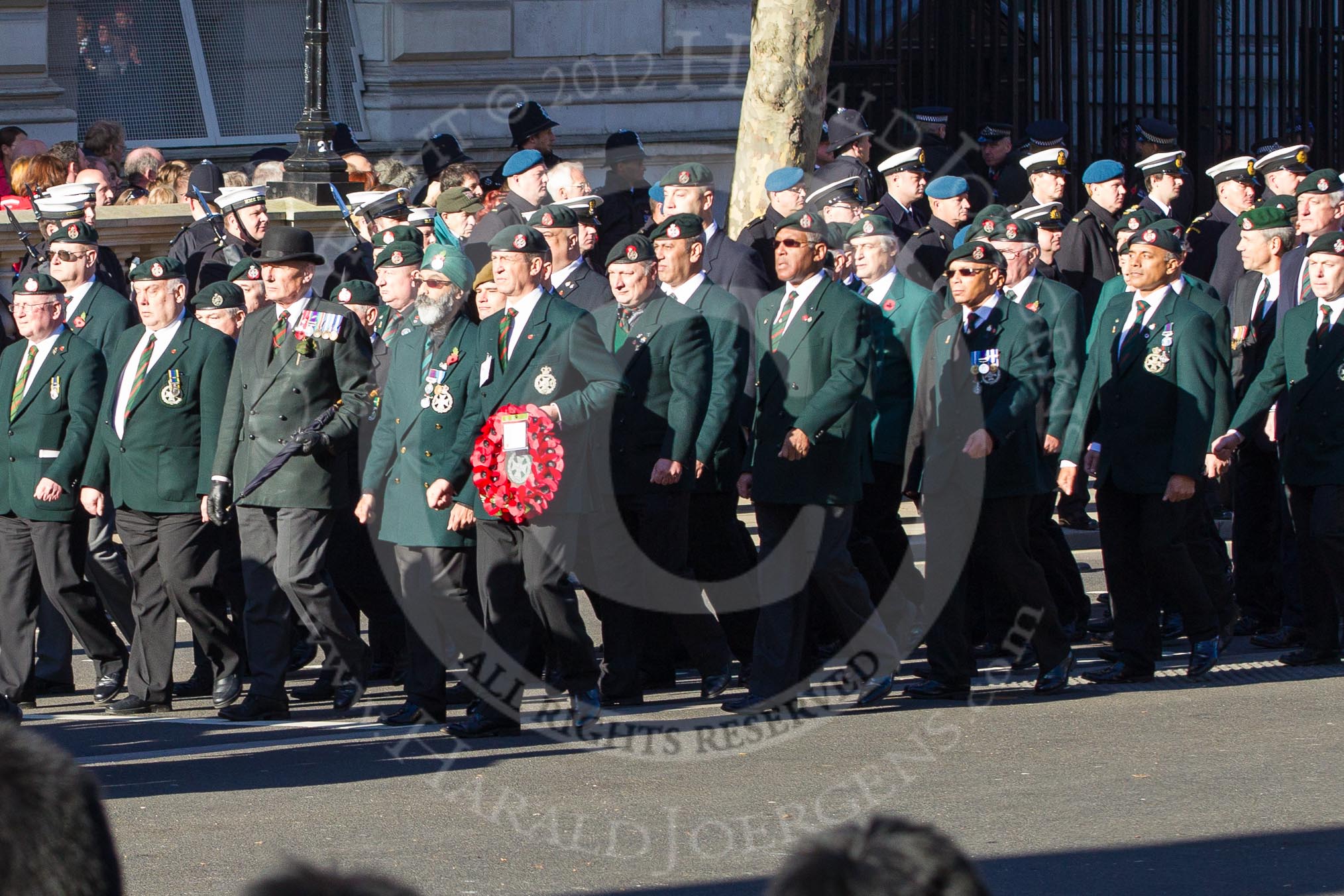 Remembrance Sunday 2012 Cenotaph March Past: Groups A16 - A19: Royal Irish Regiment Association/
Durham Light Infantry Association/King's Royal Rifle Corps Association/Royal Green Jackets Association..
Whitehall, Cenotaph,
London SW1,

United Kingdom,
on 11 November 2012 at 11:50, image #654