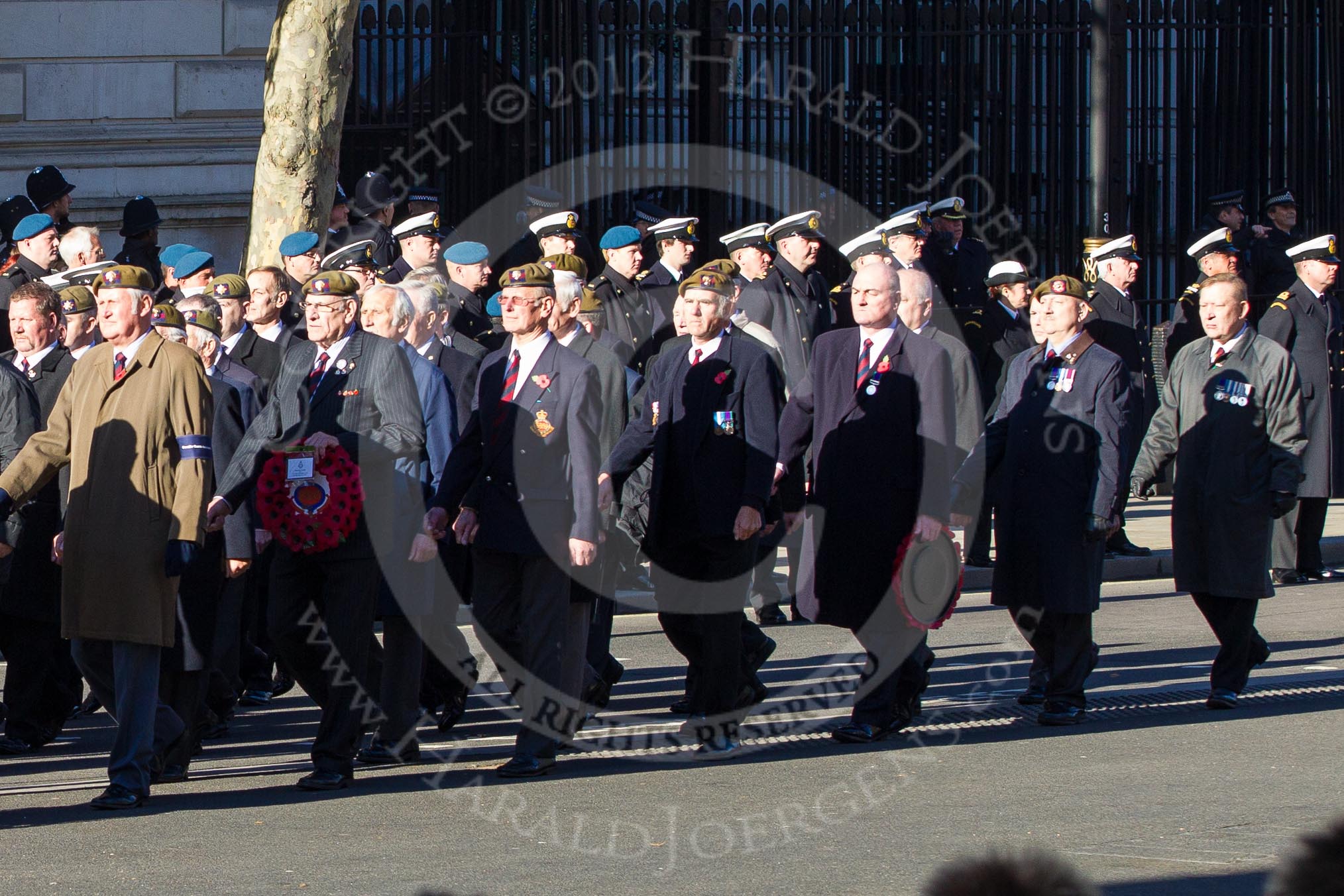 Remembrance Sunday 2012 Cenotaph March Past: Group A25 - Argyll & Sutherland Highlanders Regimental Association and A26 - Grenadier Guards Association..
Whitehall, Cenotaph,
London SW1,

United Kingdom,
on 11 November 2012 at 11:52, image #741